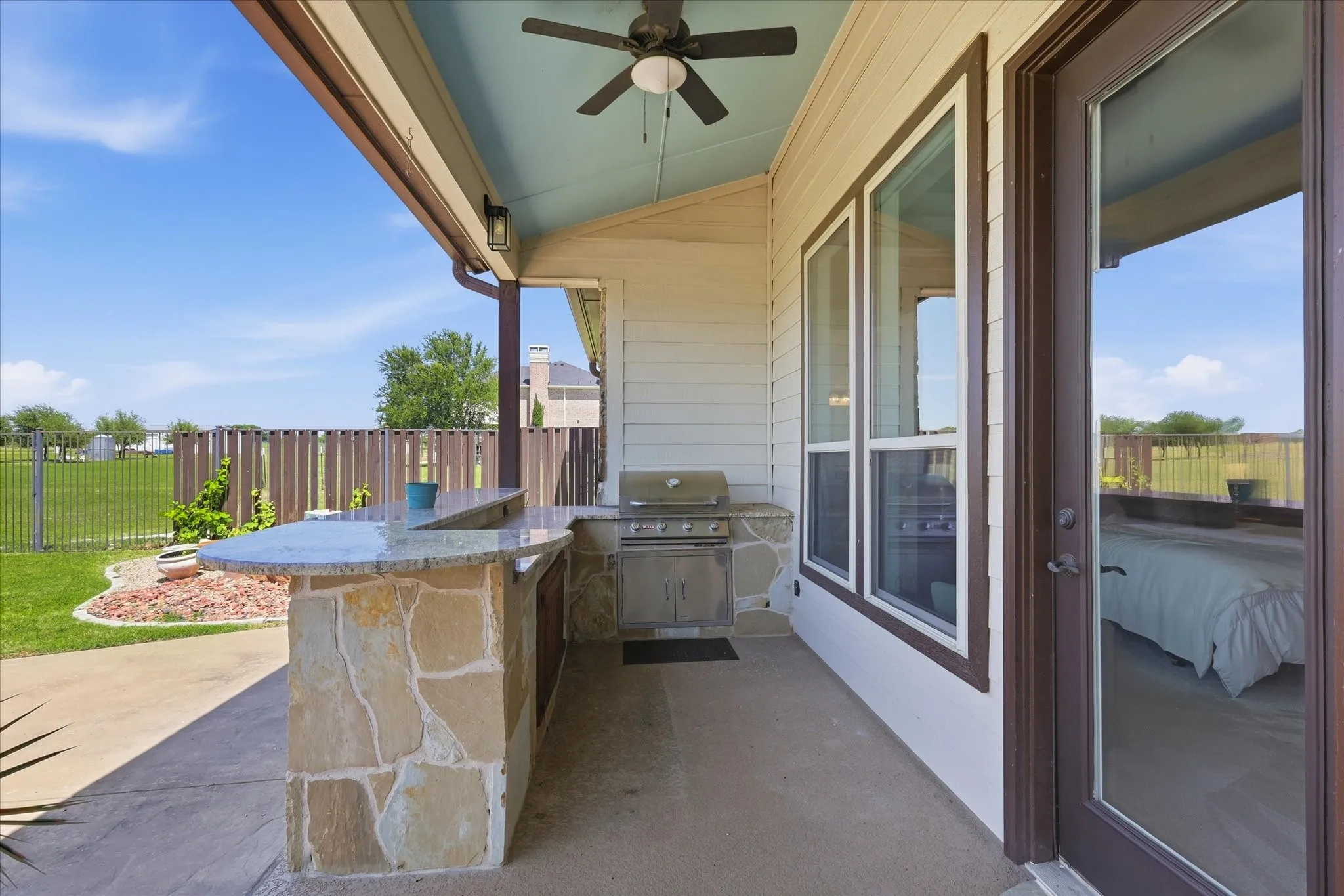 Large Outdoor Kitchen with Propane Grill.