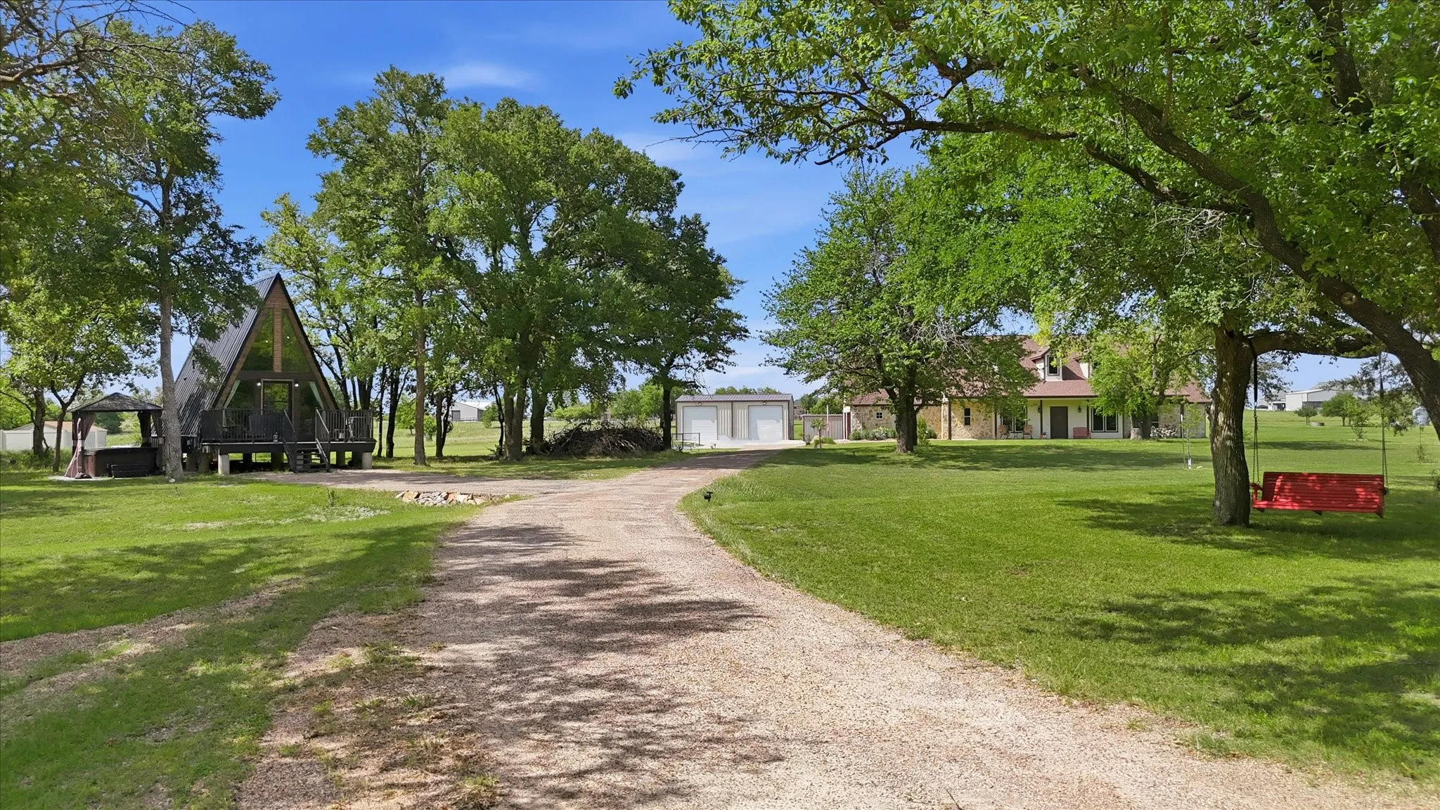 Long Driveway Leading to Tiny Cabin and Primary Home.
