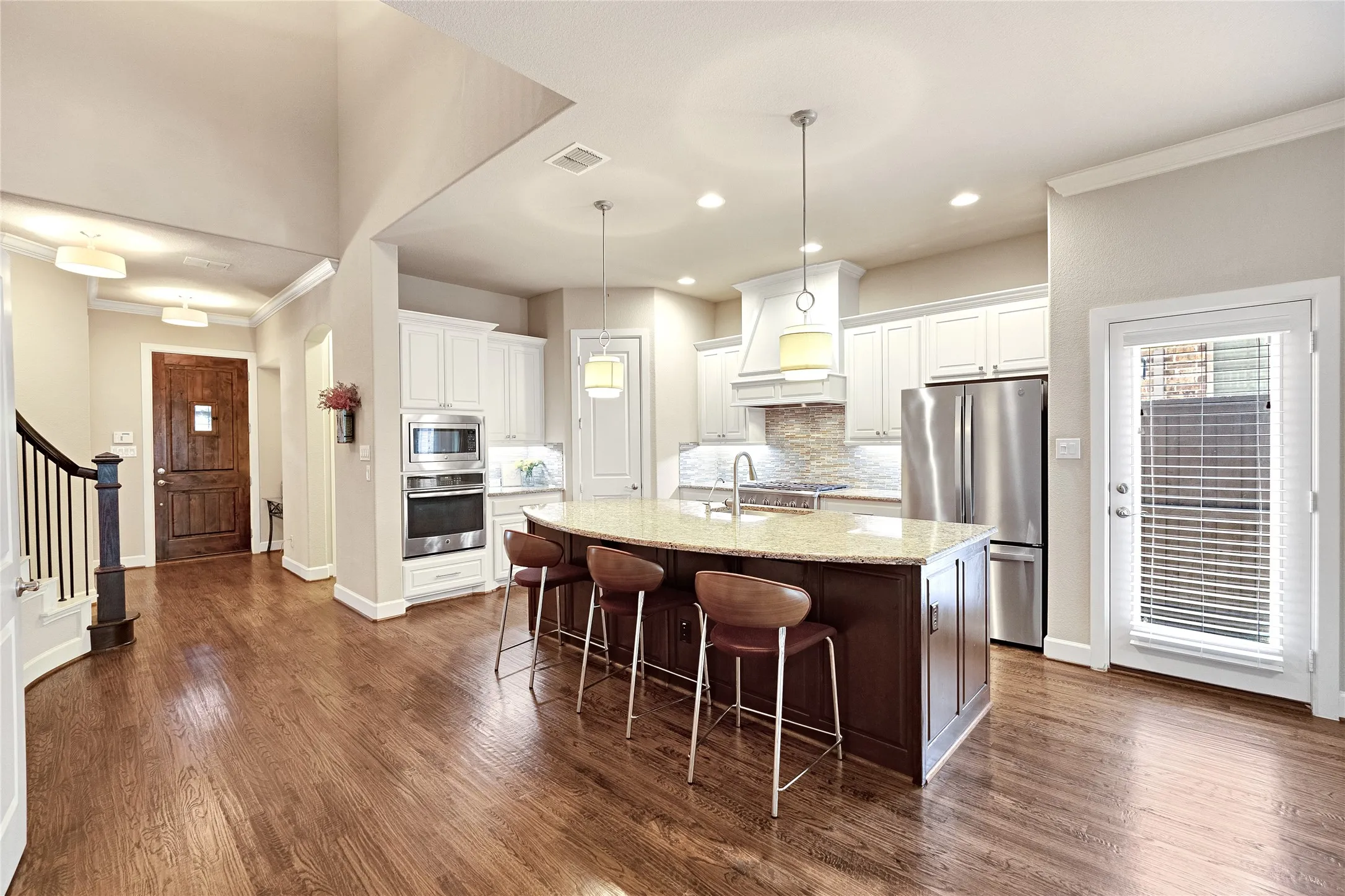 Open concept with high end gas cook top.