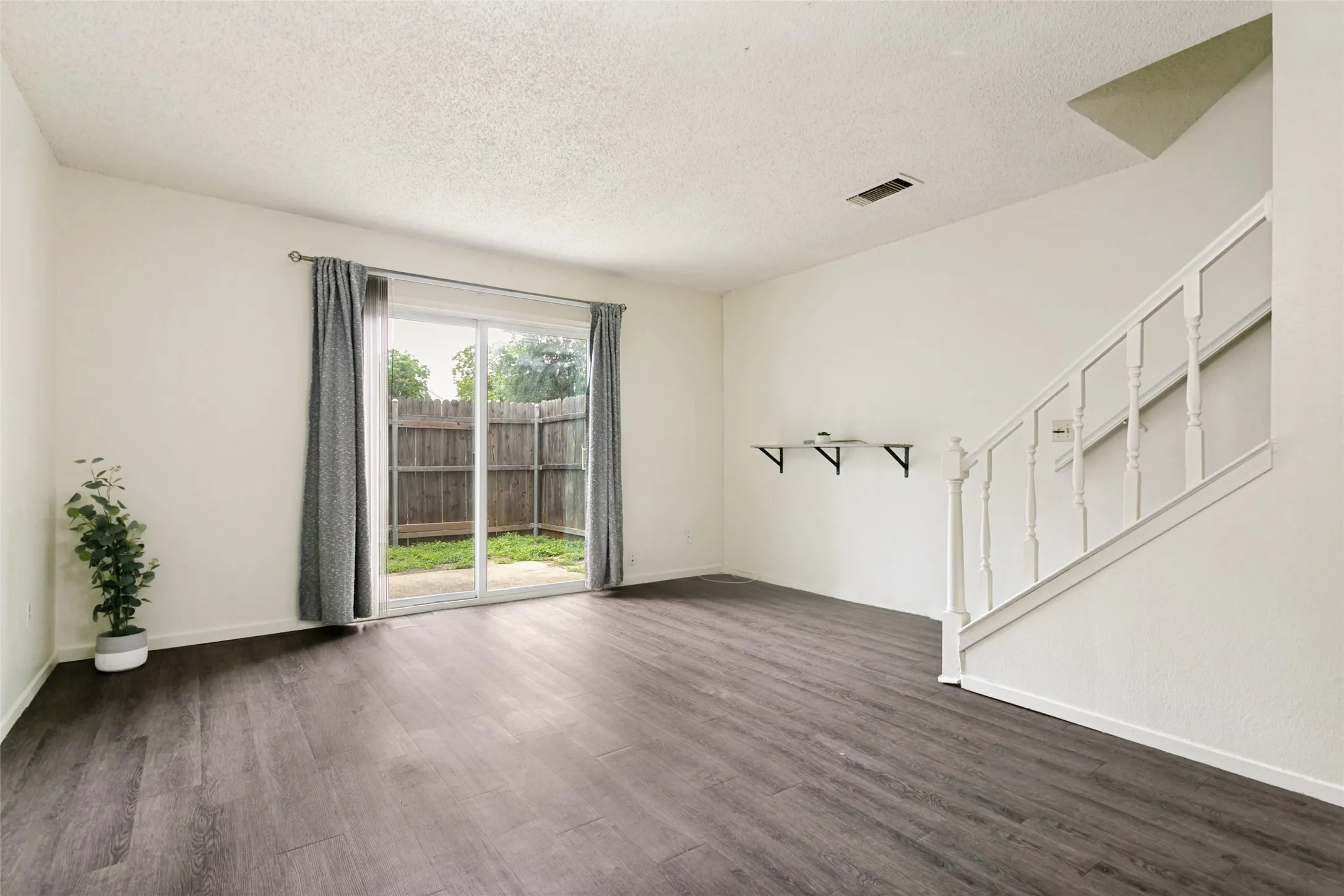 Living Room with sliding glass door to backyard