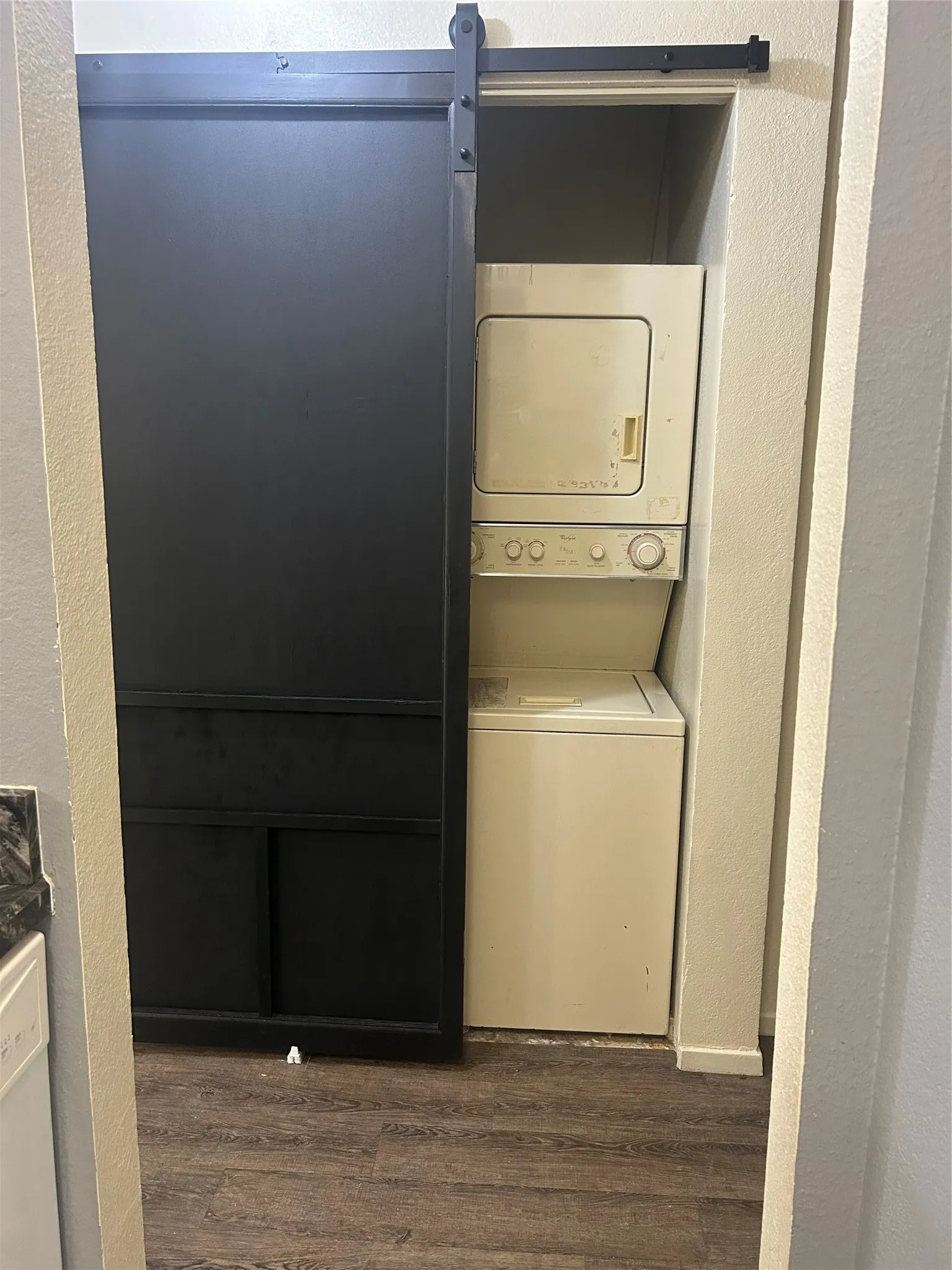 Utility closet with Barn Door - Stackable Washer and Dryer Space