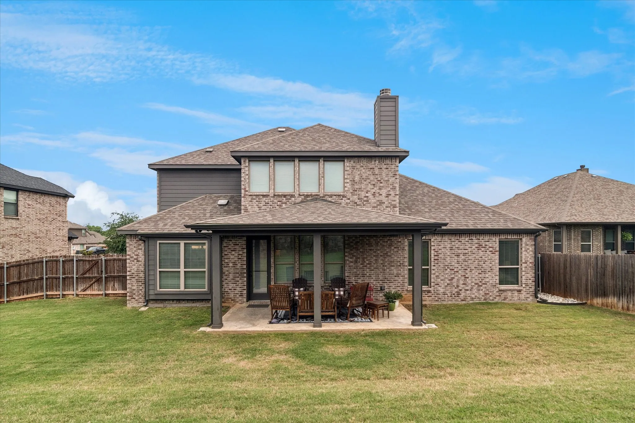 Expansive backyard with a covered patio
