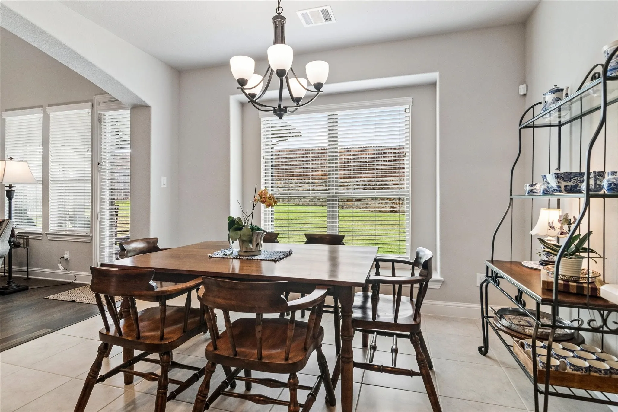 Breakfast area featuring a large window with seating