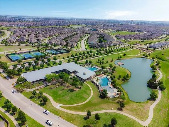 Aerial perspective showcasing a community with multiple amenities