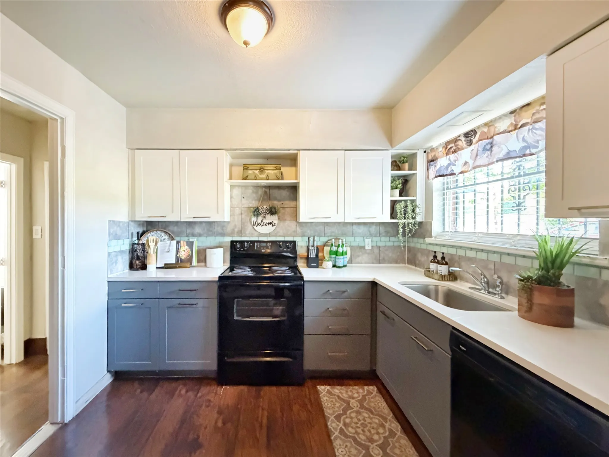 Stylish backsplash and marble countertops are a chef's dream.