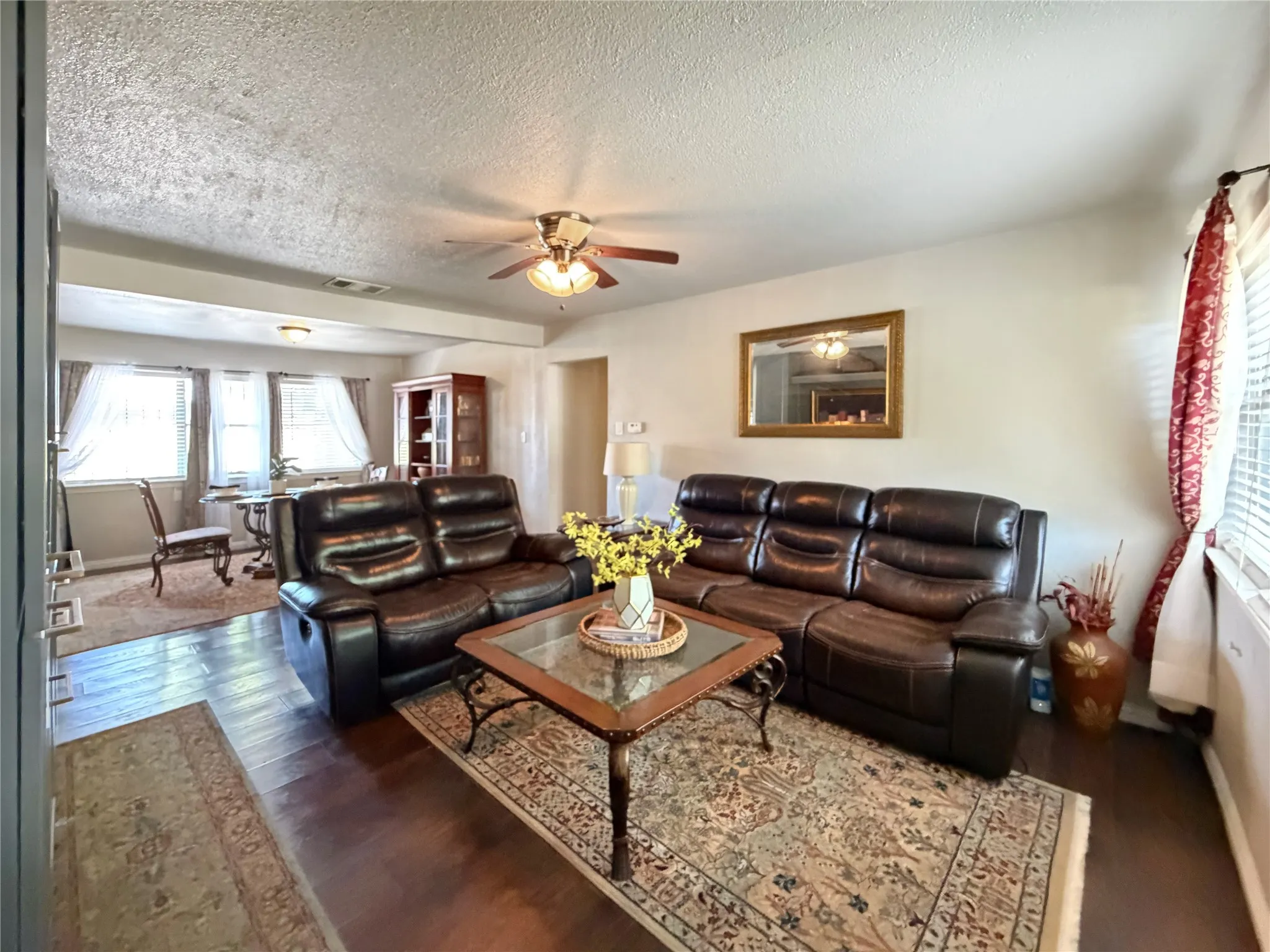 The open-concept floor plan flows seamlessly into the dining area.