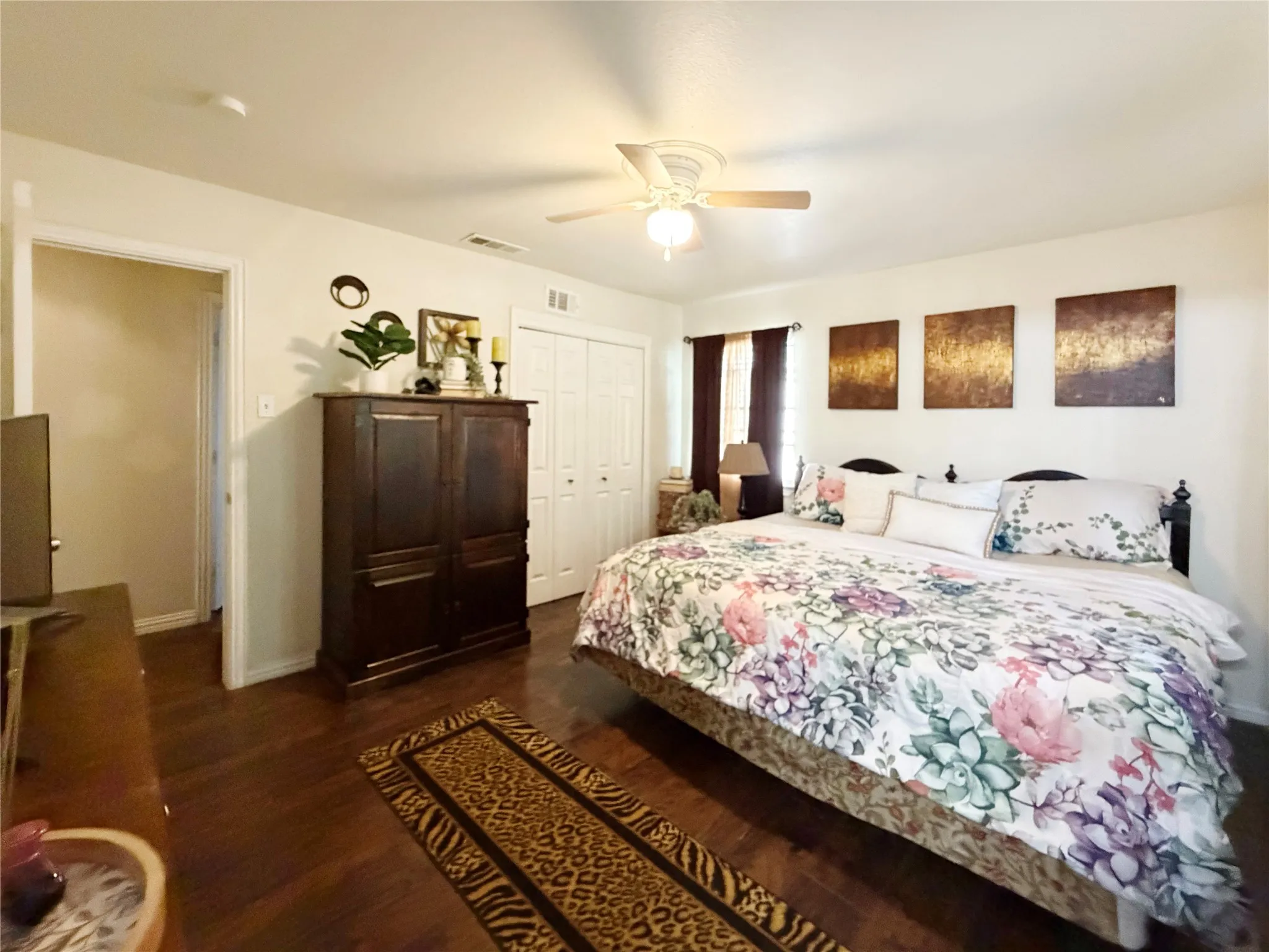 The primary bedroom offers a private ensuite bathroom.