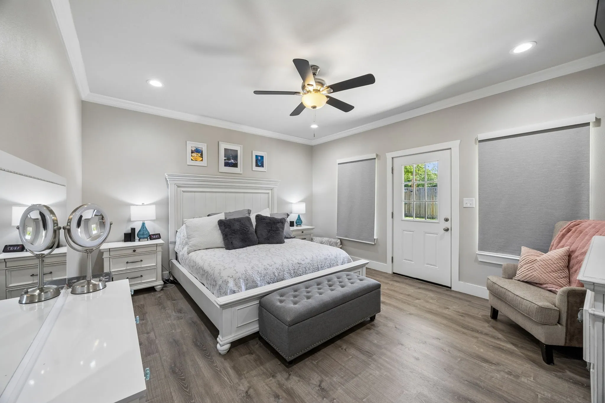 Primary Bedroom featuring wood-finish flooring, recessed lighting, a ceiling fan, and crown molding