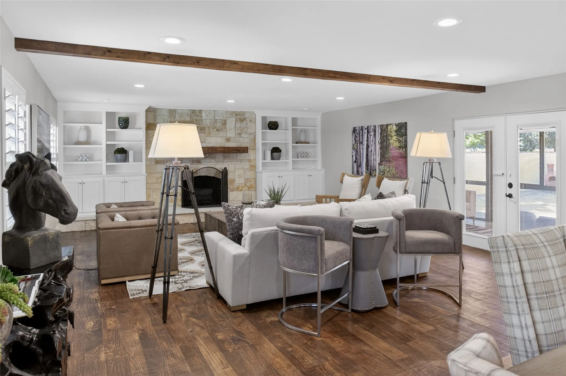 View of living room from dining area. Living room is spacious and open.
