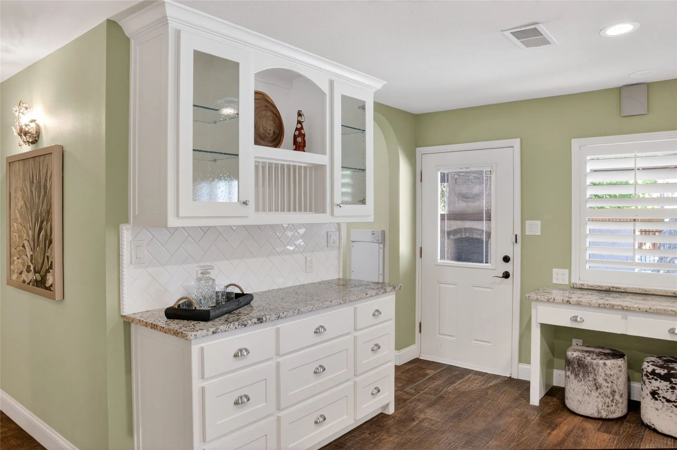 Anther view of the kitchen featuring a butlers pantry