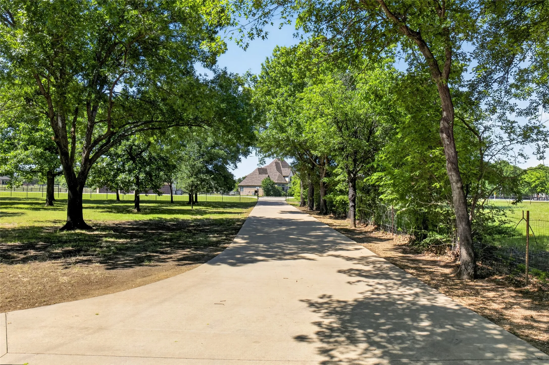 View of driveway looking towards entry gate