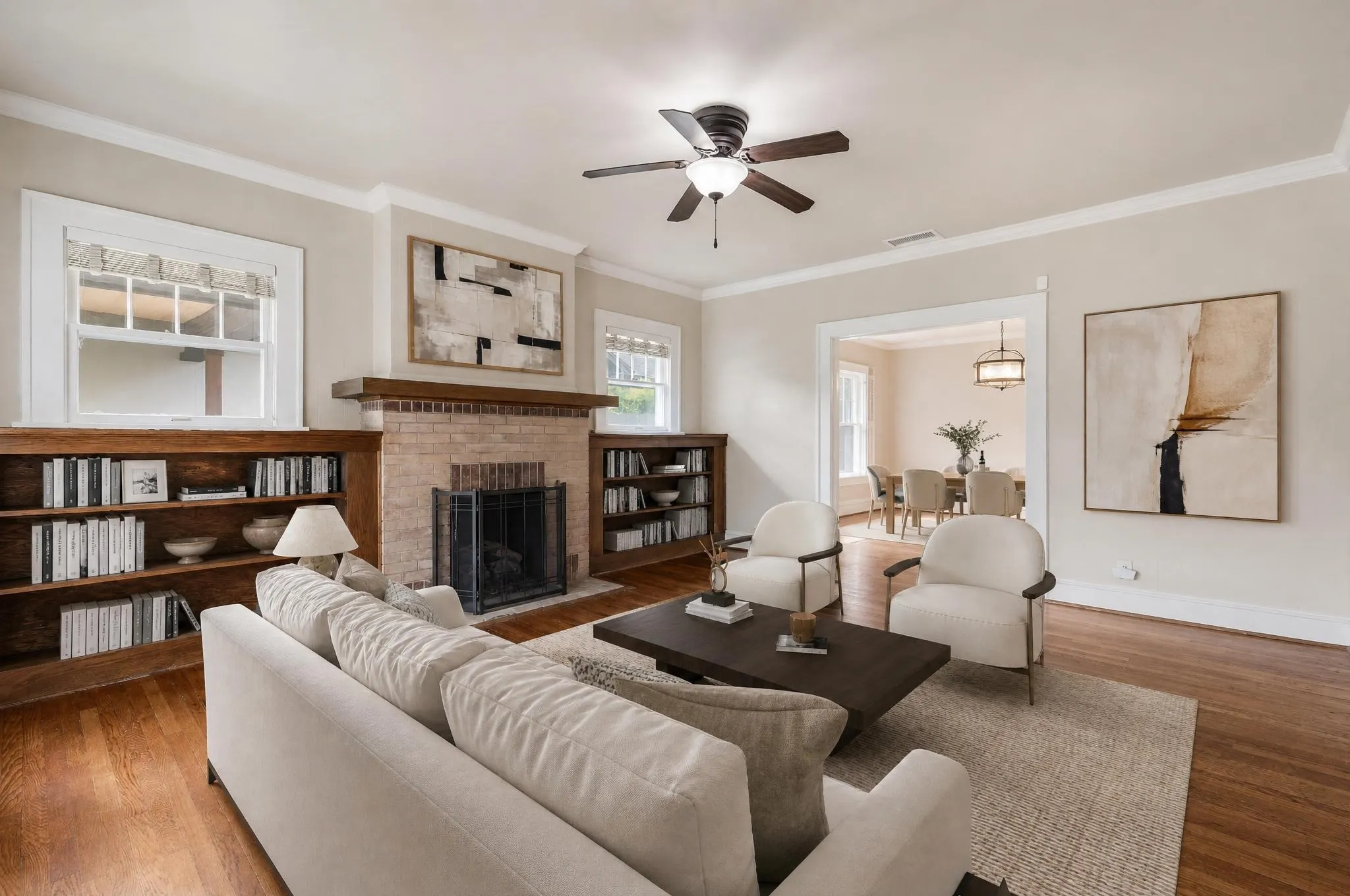 Bright living room featuring hardwood floors.