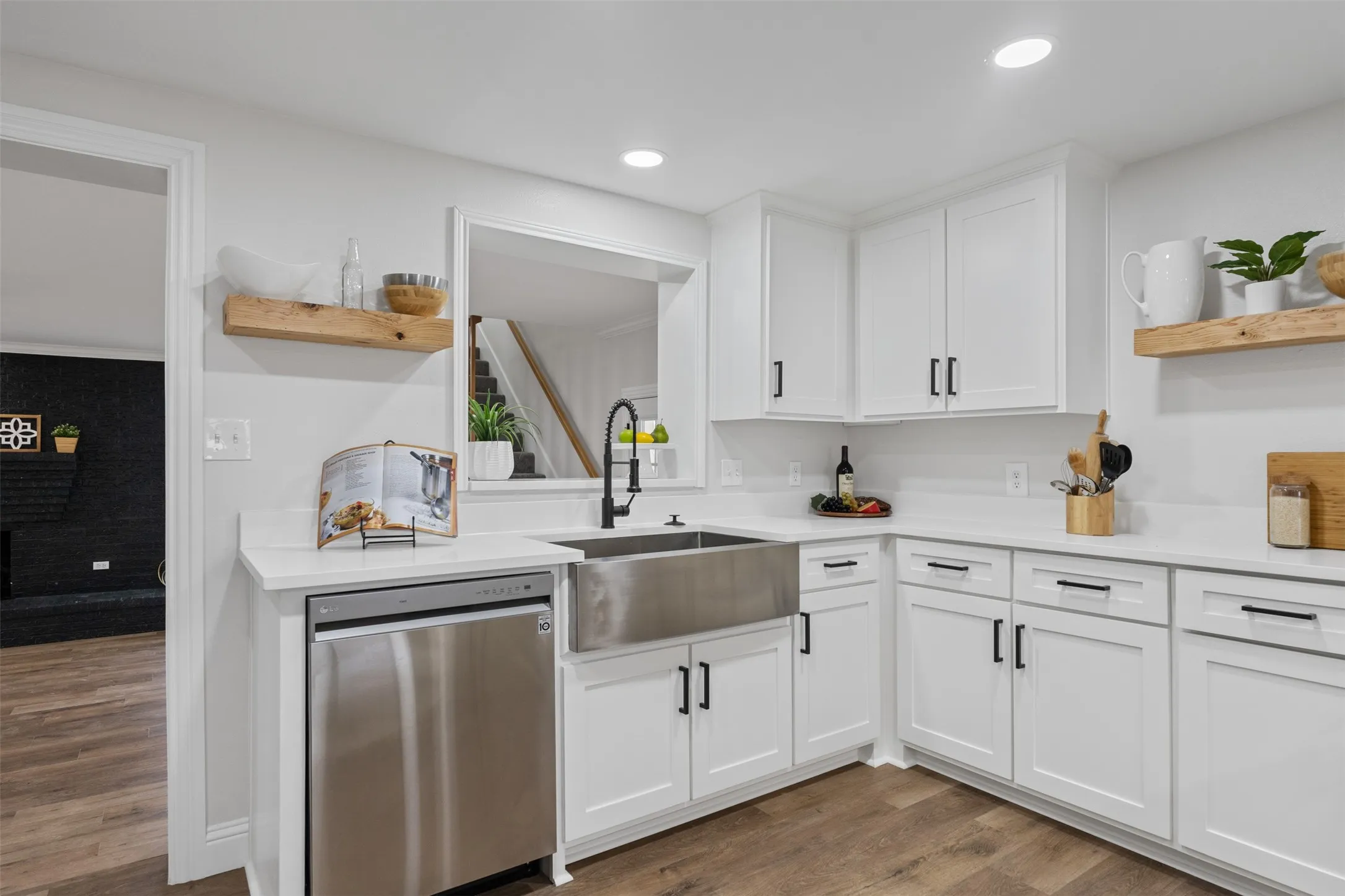 Designer kitchen finishes with farmhouse sink and custom details