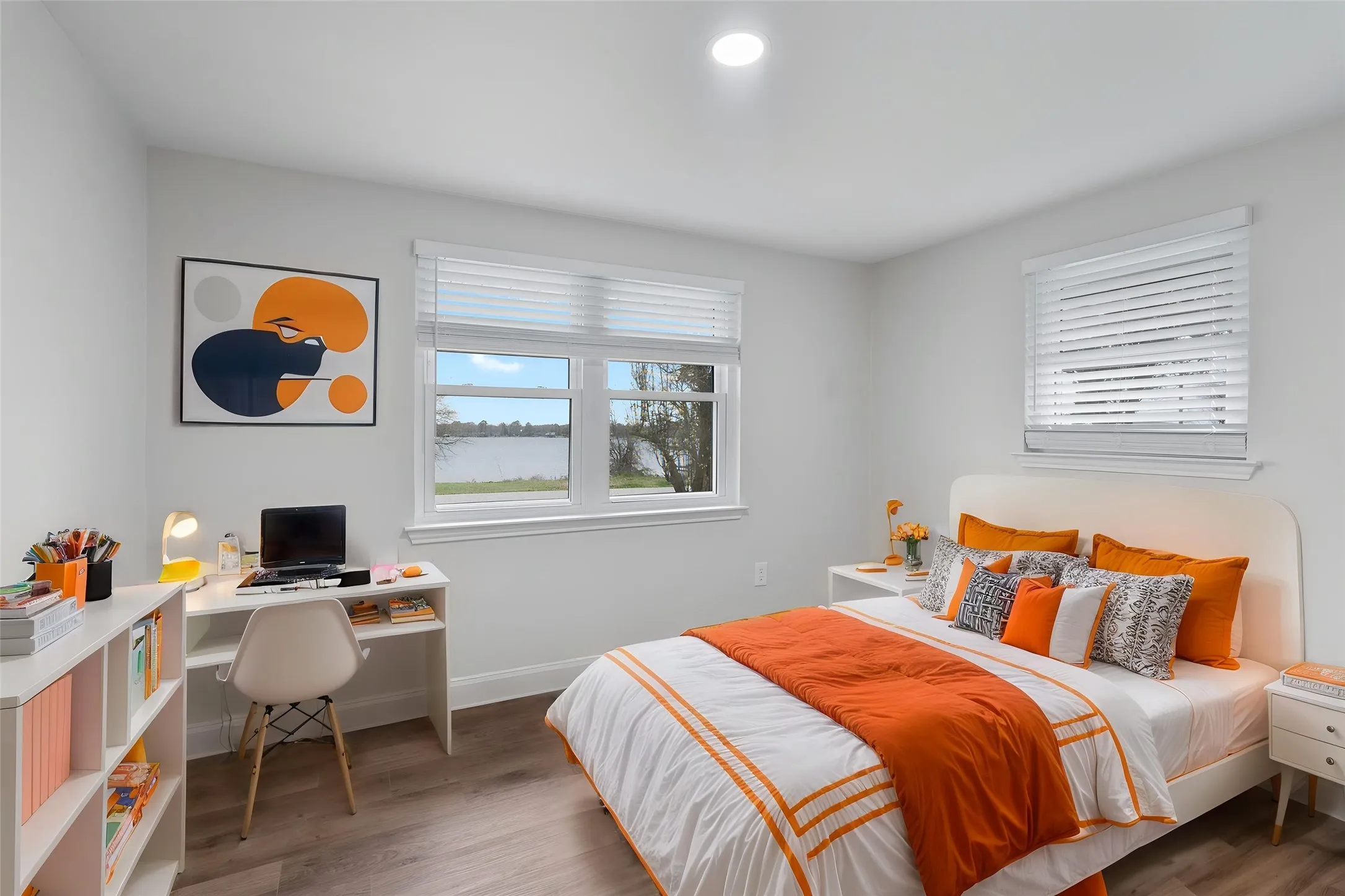 Bedroom featuring peaceful lake views