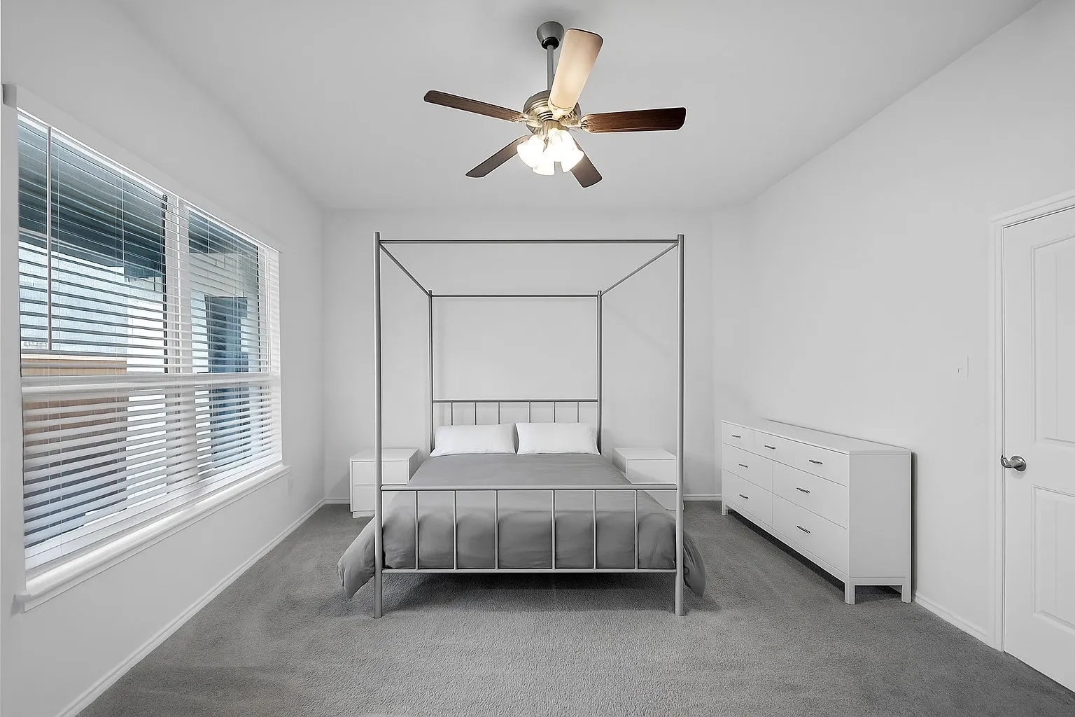 Bedroom with carpet flooring and ceiling fan