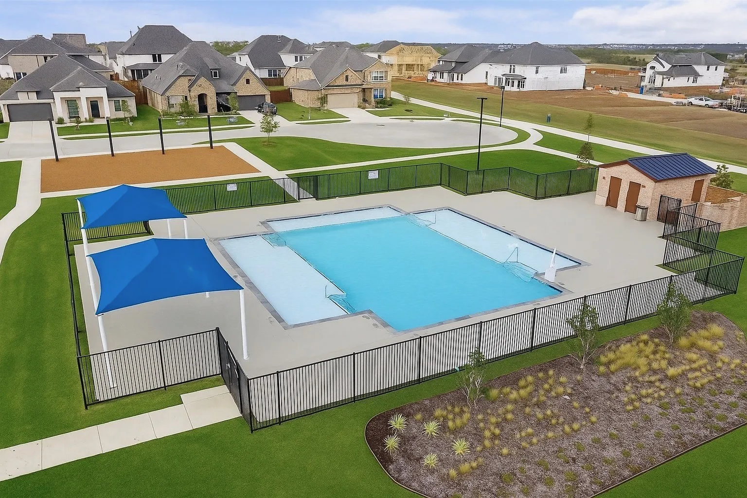 Community pool featuring a patio area