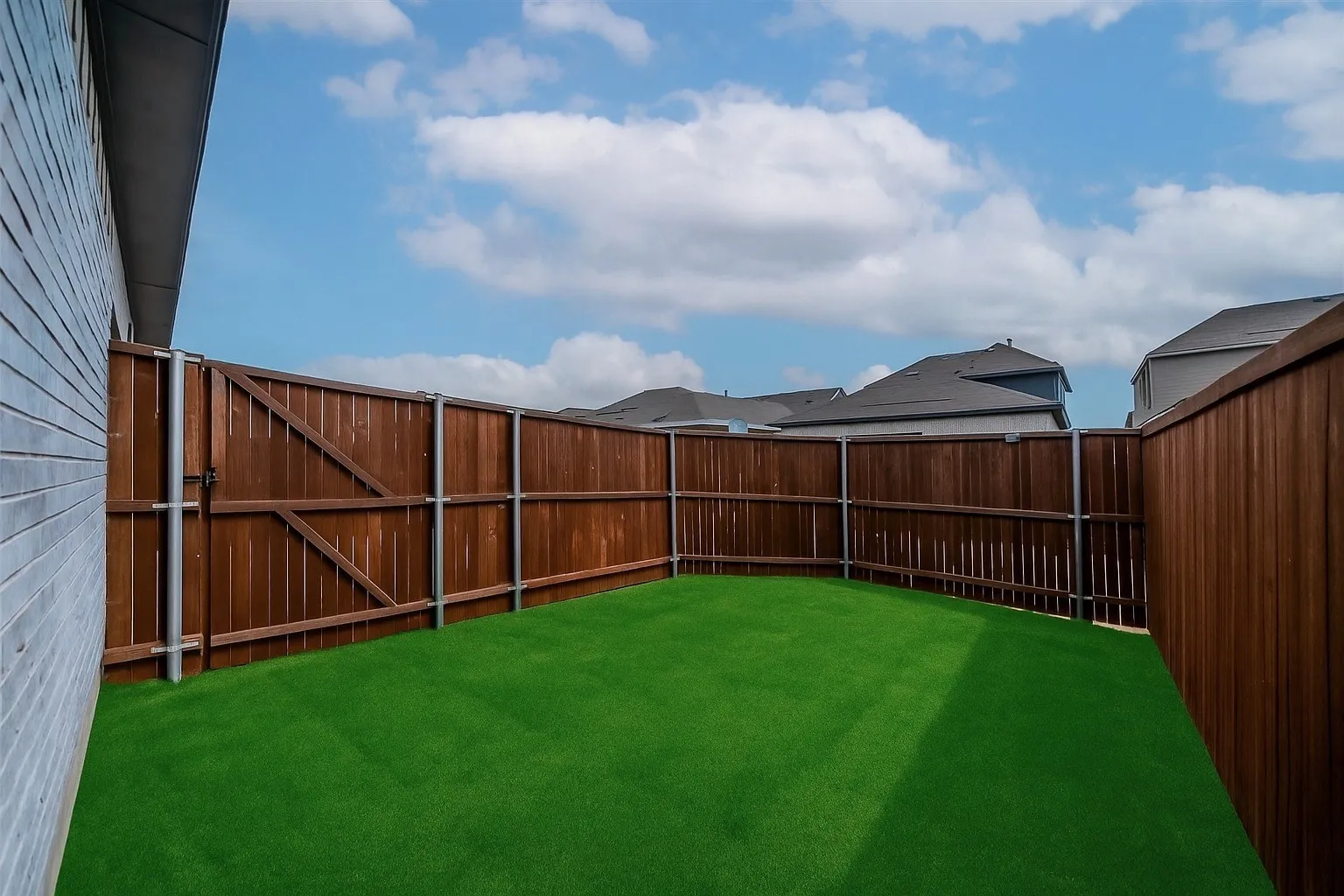 View of fenced backyard