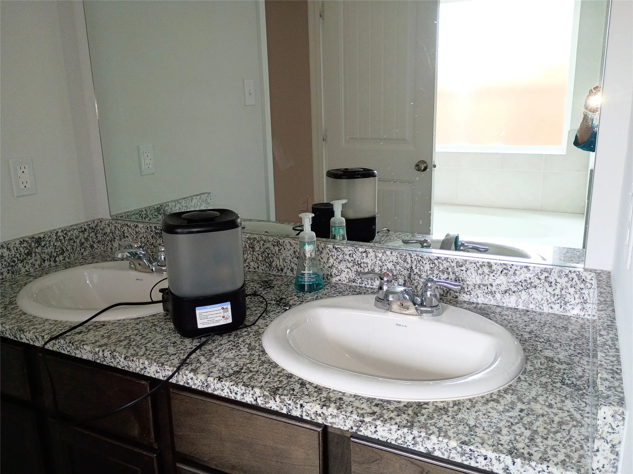 Double vanity, could not show both sides without putting my own image in the mirror