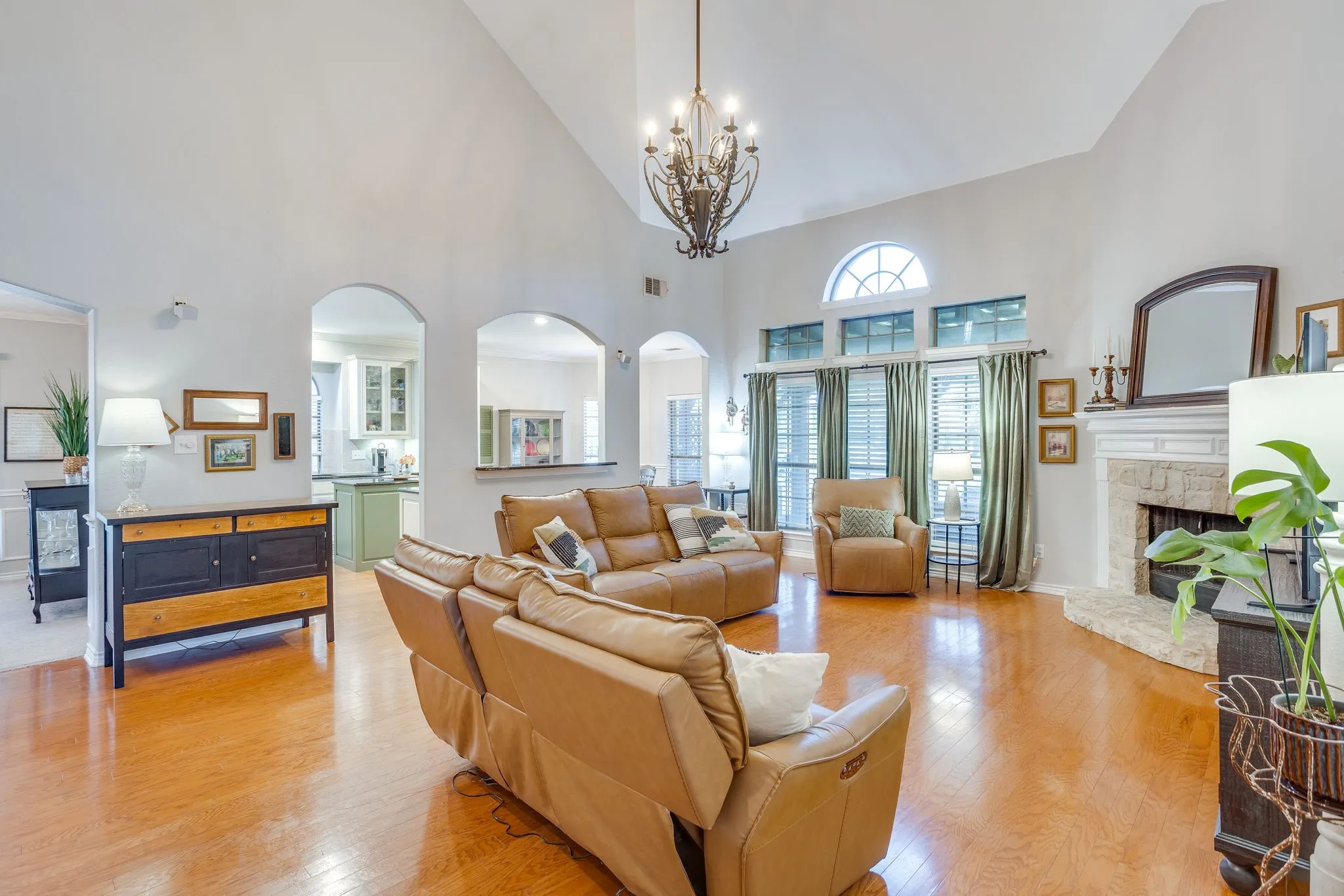 Vaulted ceilings in the main living area with wood-finish flooring