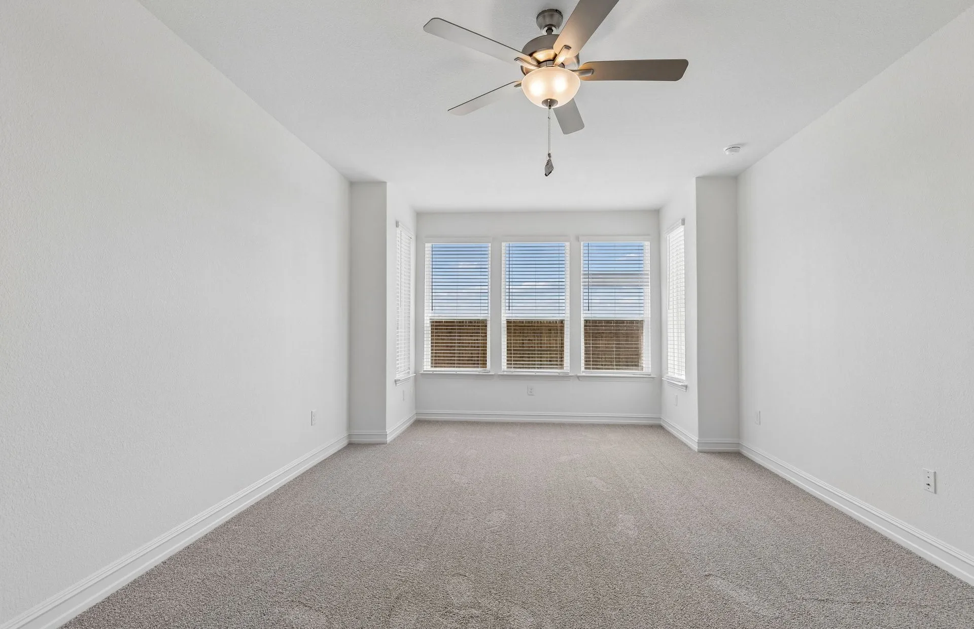 Spacious owners suite with large windows