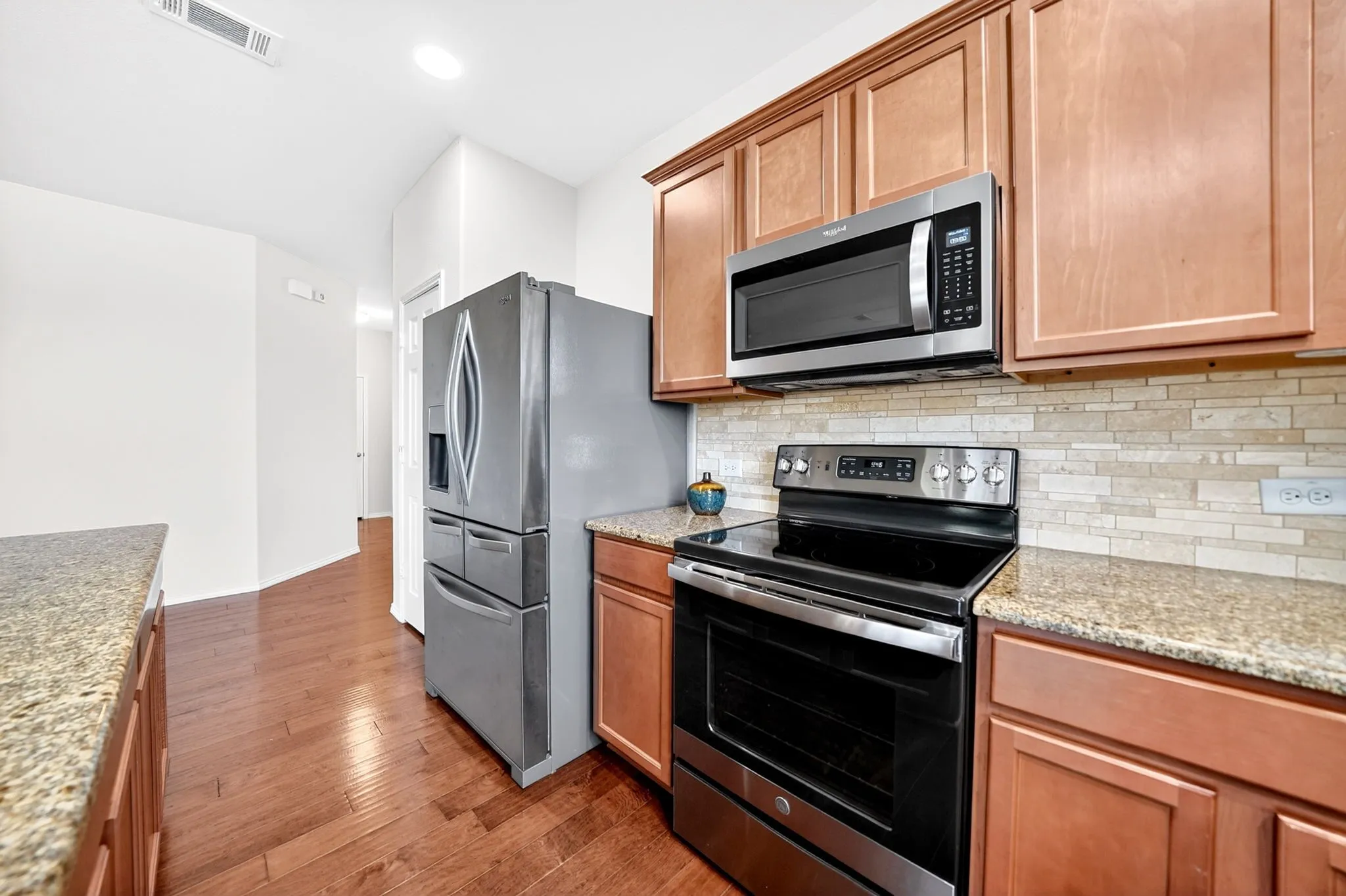Bonus - Refrigerator conveys with property.