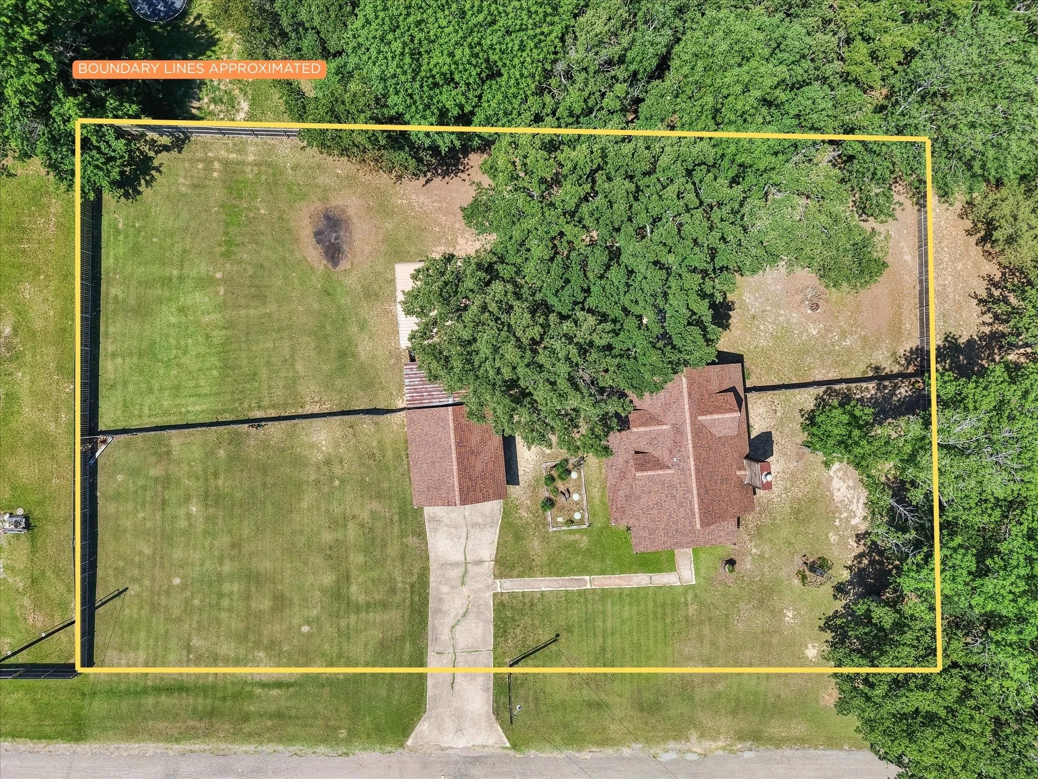 Overhead property view illustrating lot boundaries and spacious yard.