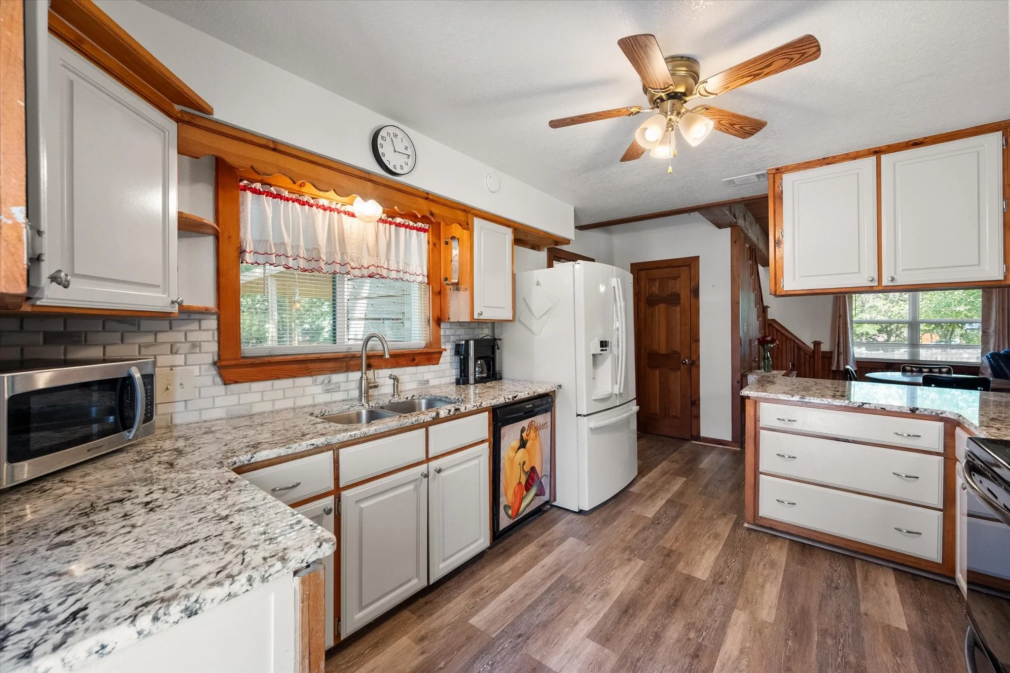 Bright eat-in kitchen with generous workspace and open layout for entertaining.