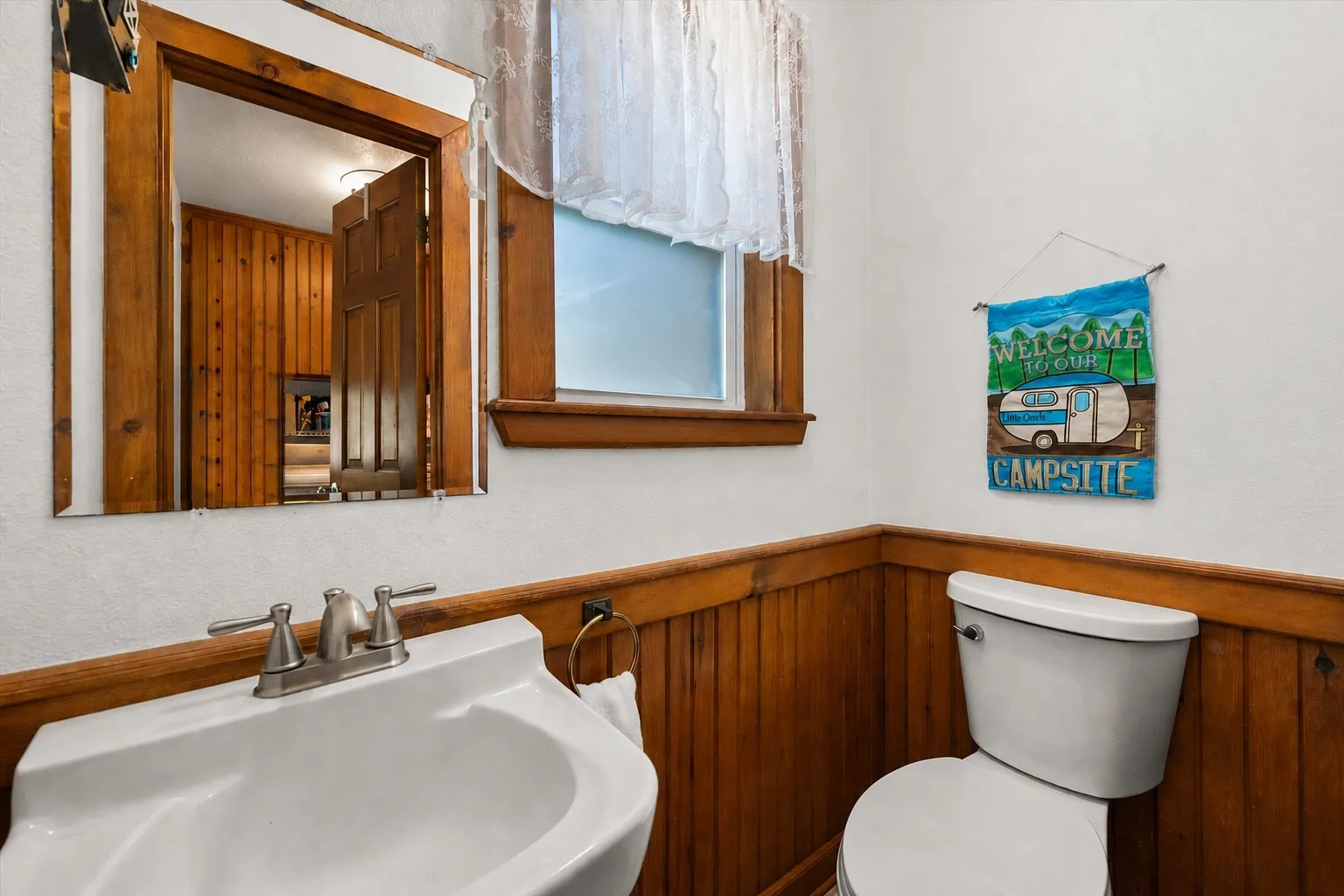 Convenient half bathroom located on the main level.