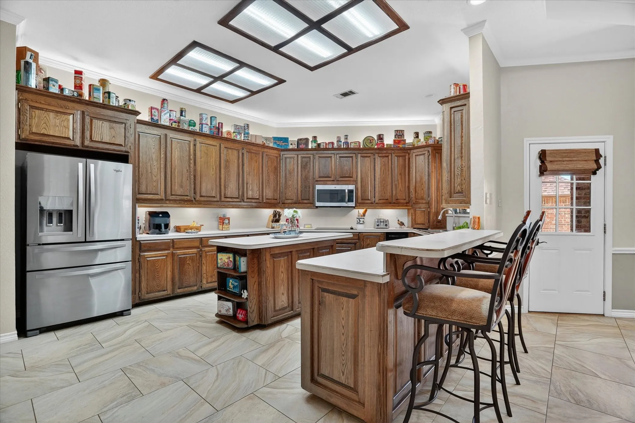 Open kitchen with generous cabinet storage.