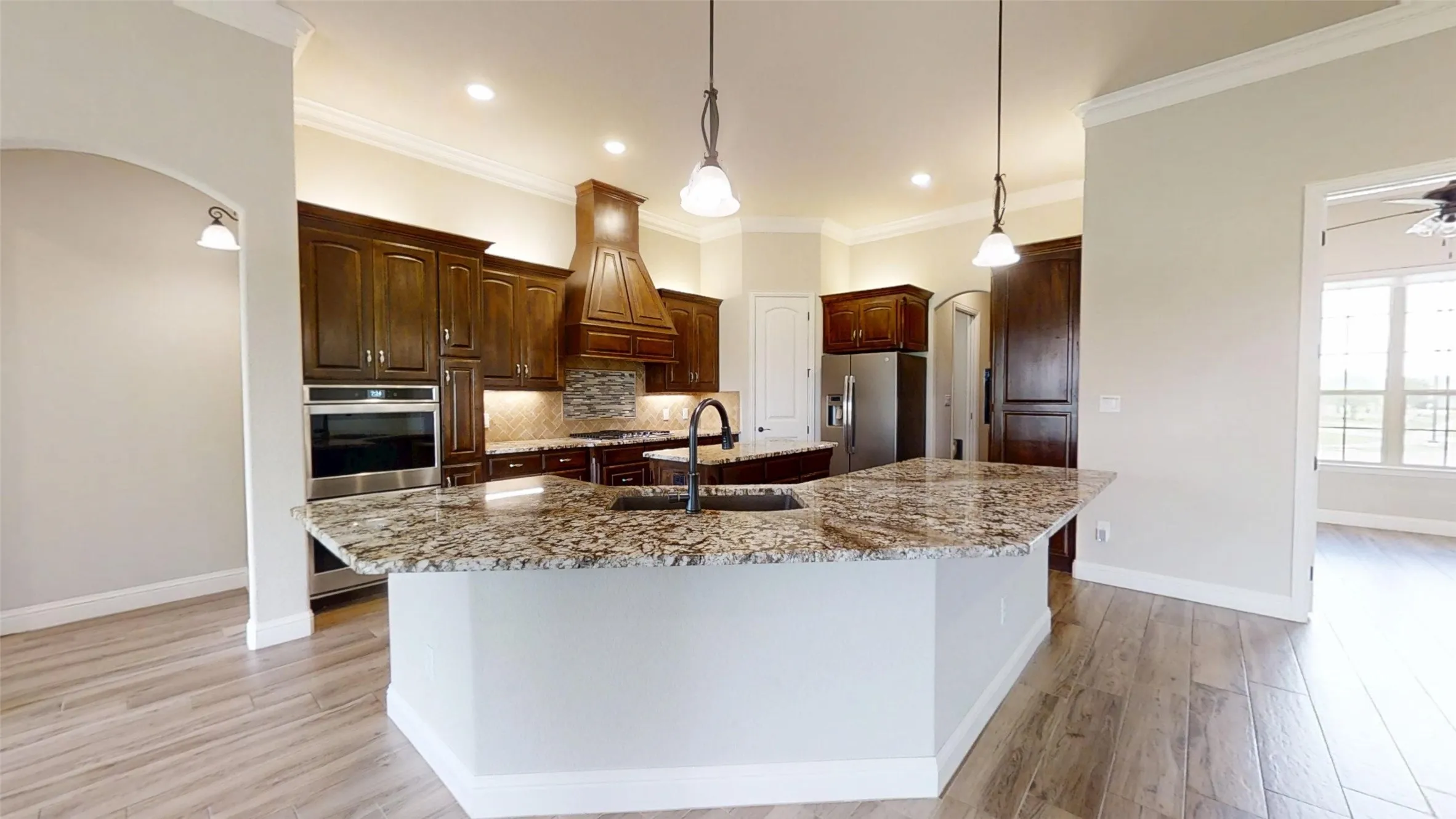 breakfast bar with sink and dishwasher