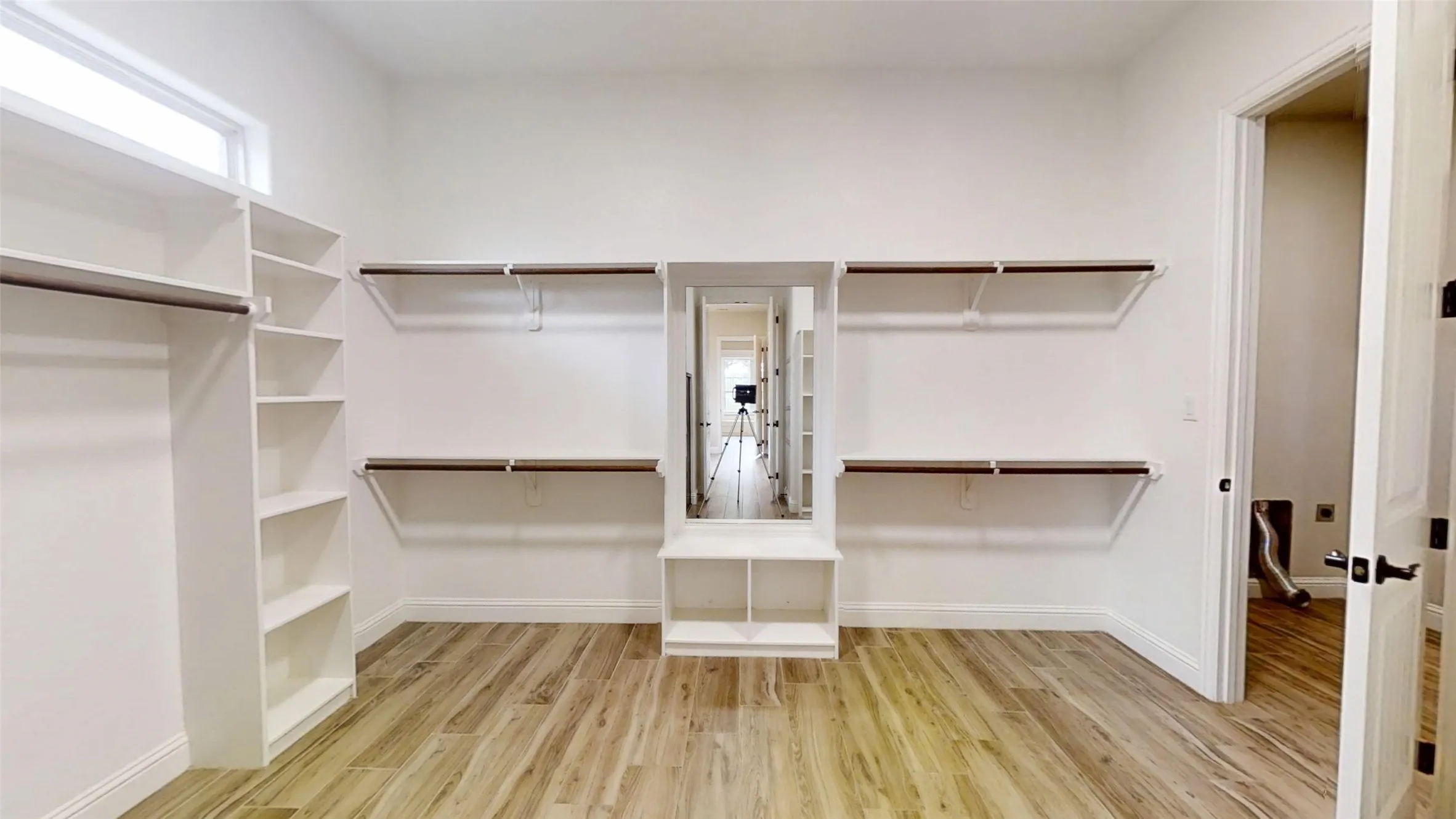 large walk-in with access to the laundry room