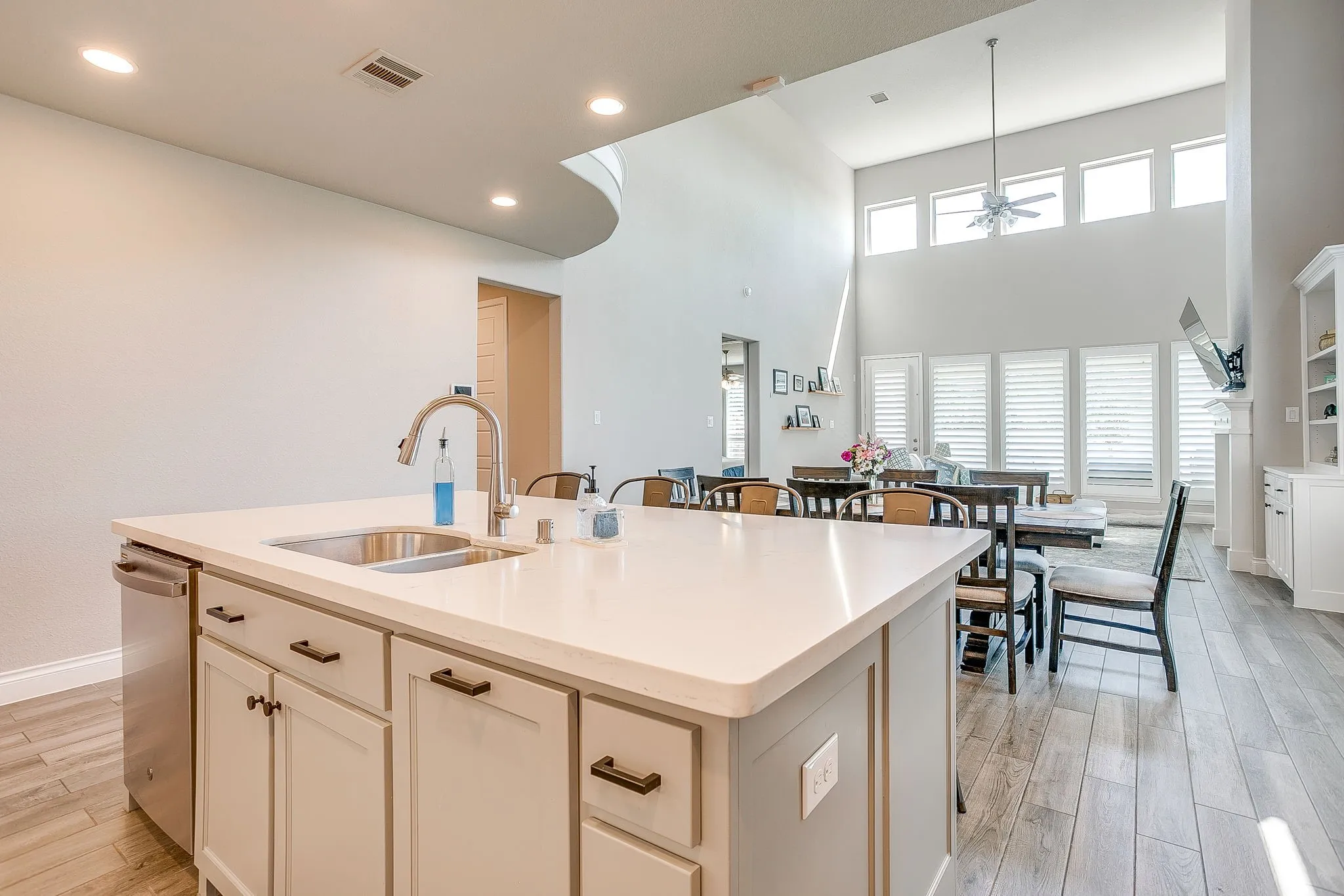 The perfect layout for family living, entertaining, and always being part of the action!
