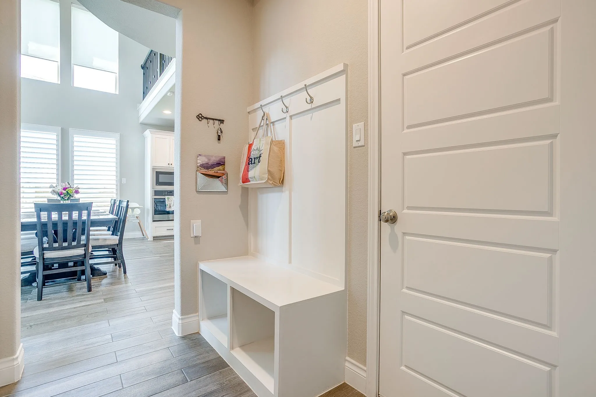 A generously sized mudroom conveniently located between the living area, garage, and main-floor guest ensuite.
