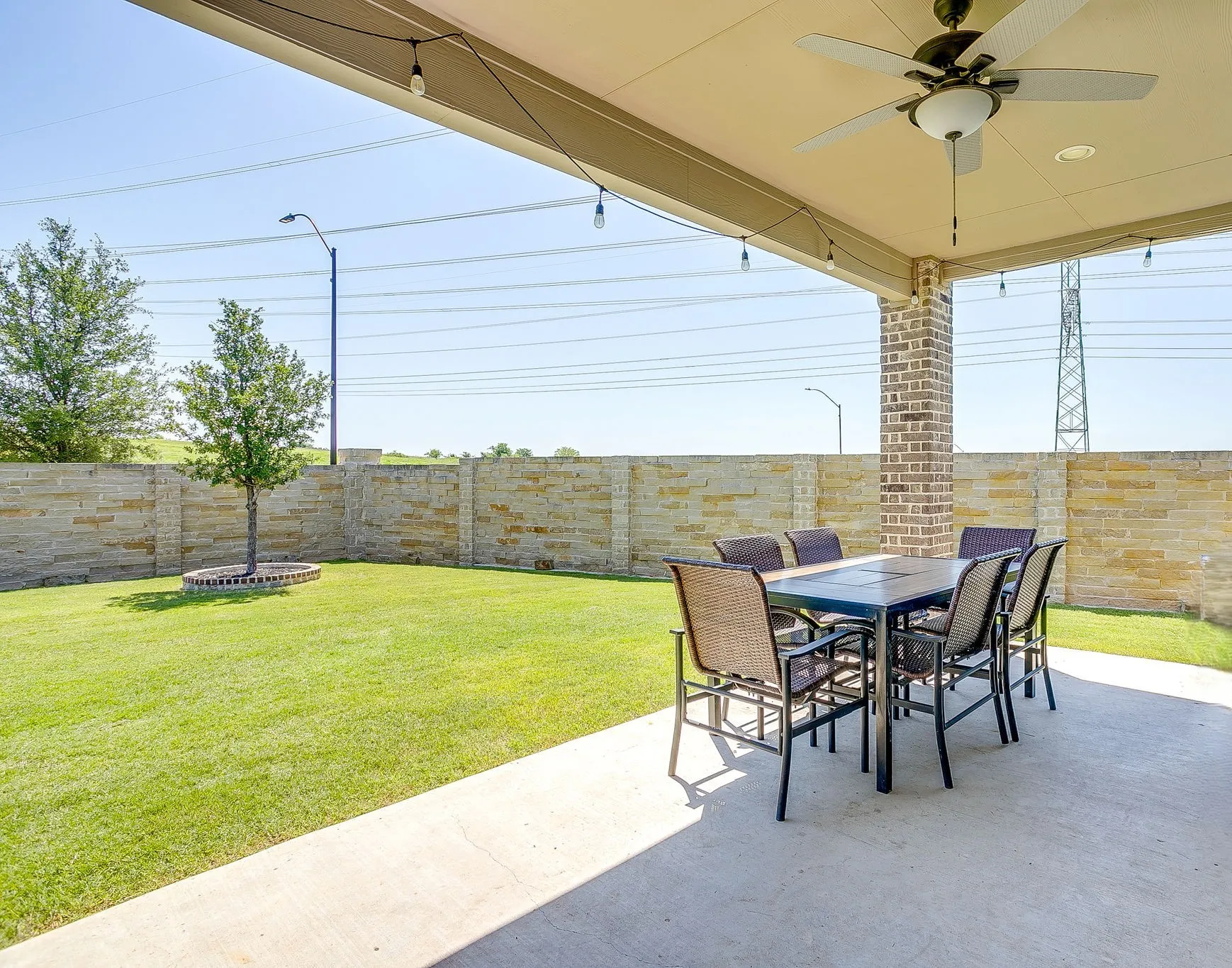 A large covered patio perfect for family gatherings, entertaining, and relaxing outdoors!
