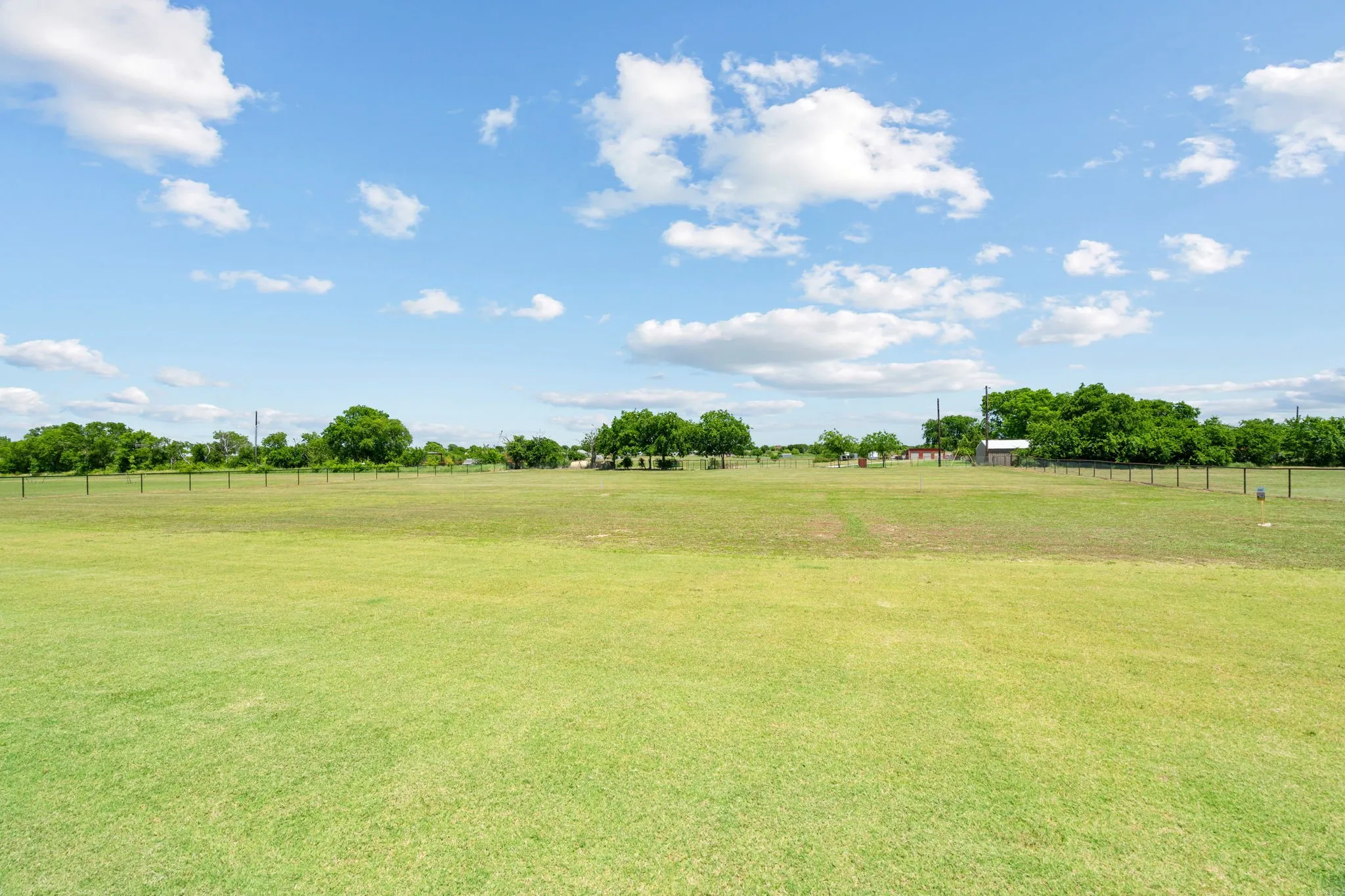 Fabulous Backyard Acreage ready for a Pool, Playset or Putting Green!