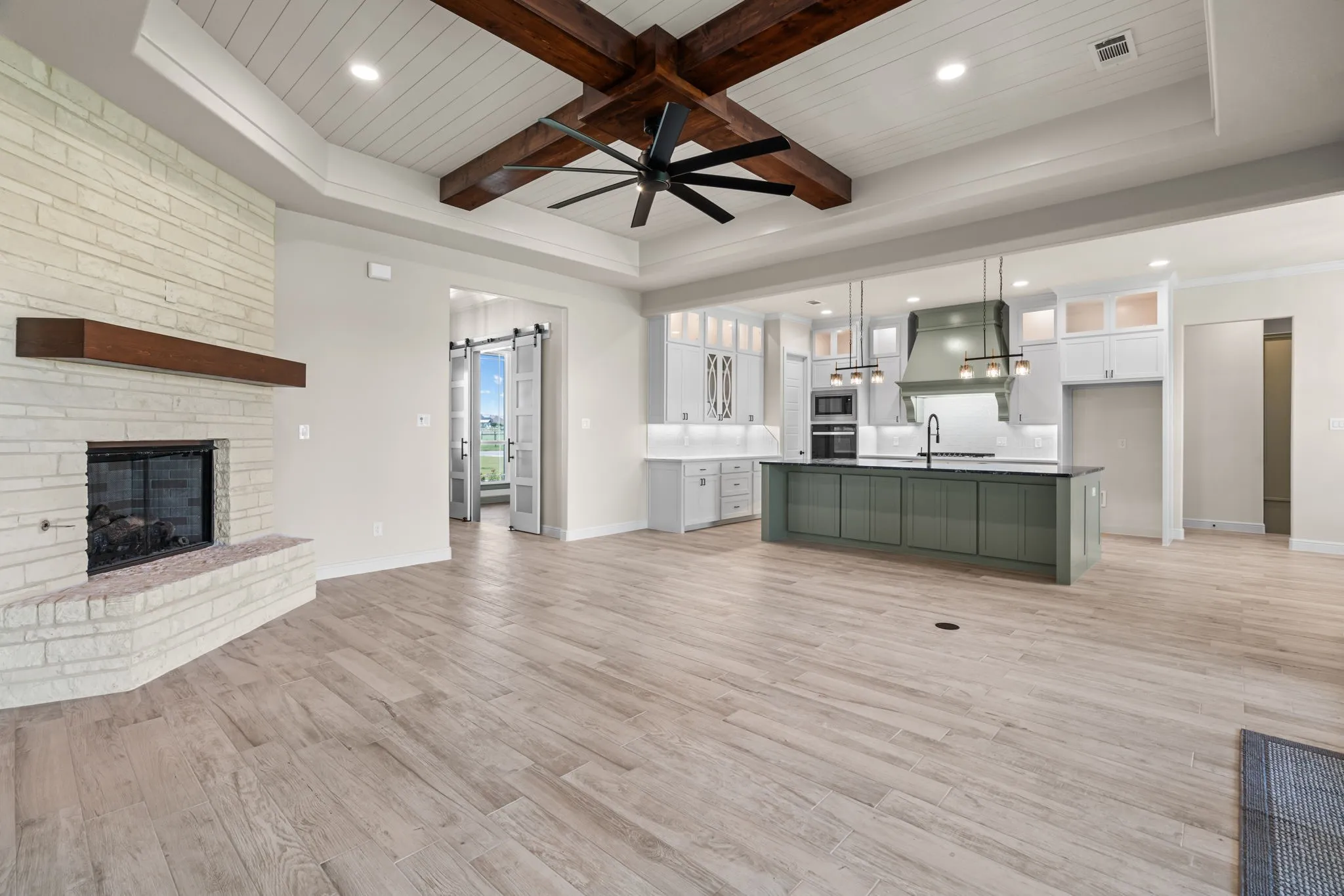 Living Room opens to the Beautiful Kitchen