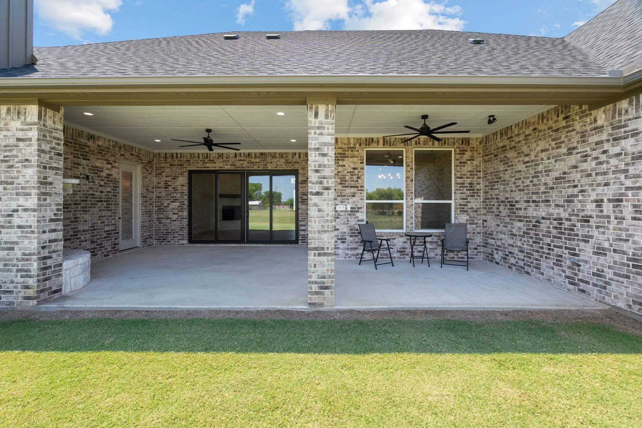 Covered Patio, Fireplace & Plenty of Outdoor Cooking Space