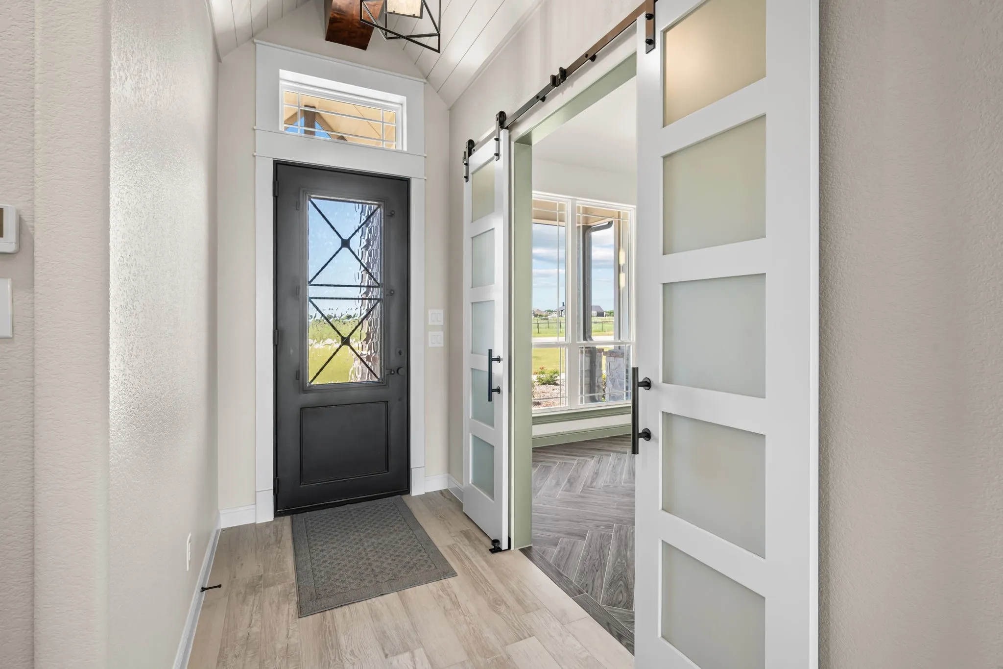 Front Entry with Iron & Glass Door & Office or Dining Room Doorway