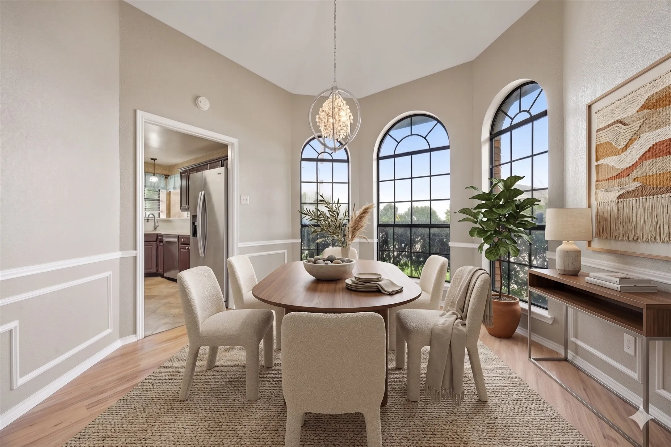 A second angle of the formal dining room at 2060 Arbor Creek Drive #B, connected to both the kitchen and living room in this Carrollton, Texas home.