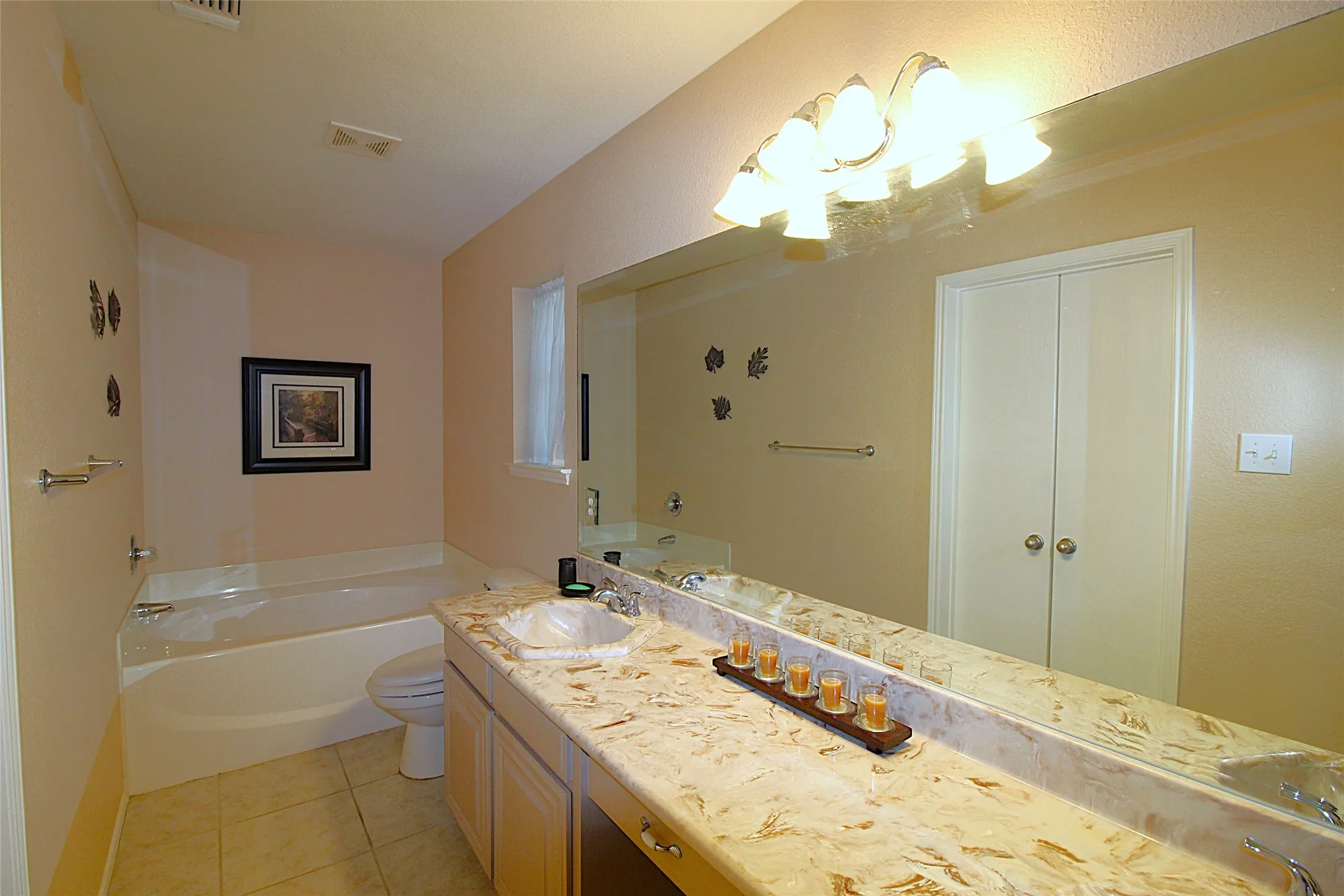 Primary Bath has dual sinks, a garden tub and a shower.