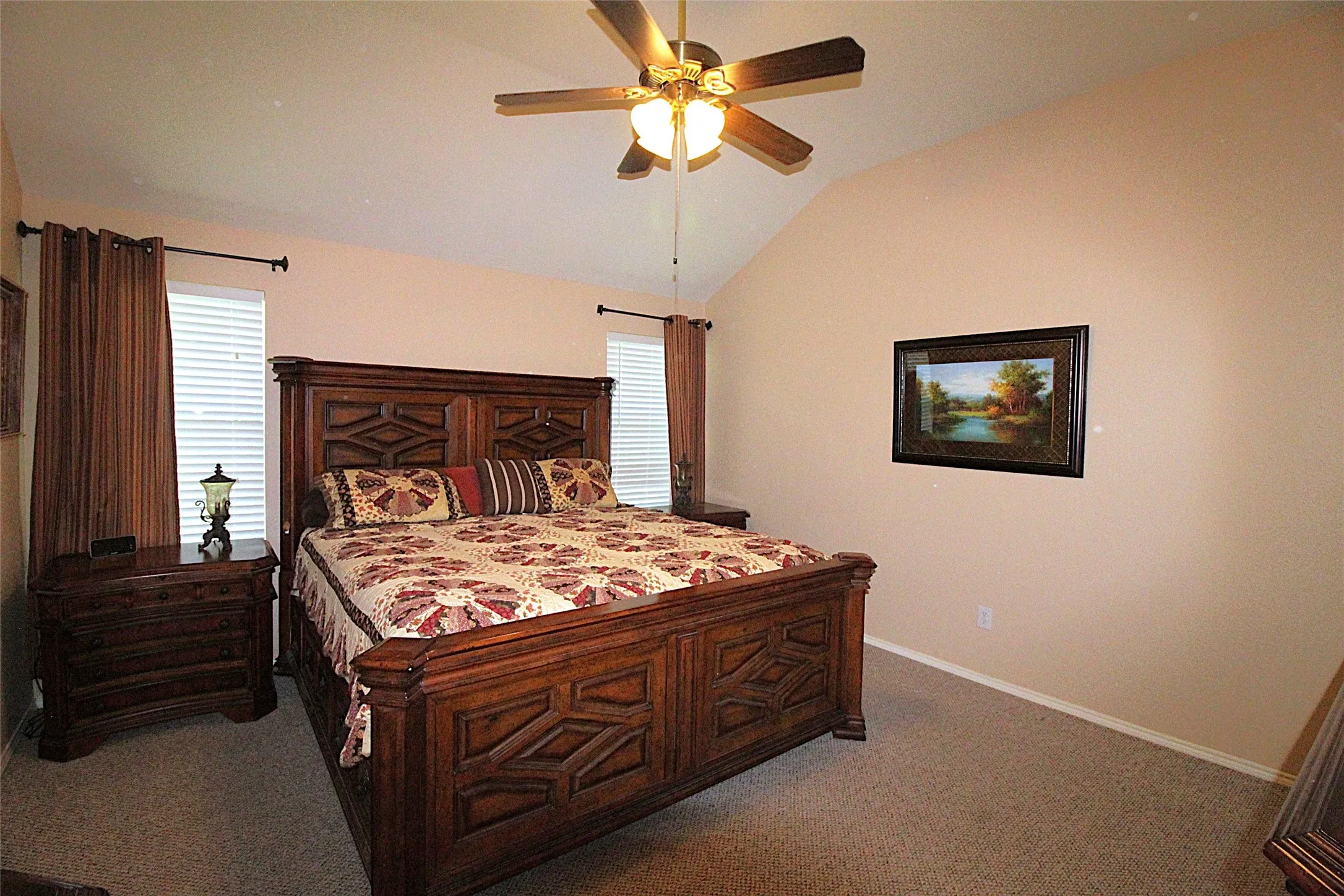 Primary Bedroom is roomy and has a walk in closet.