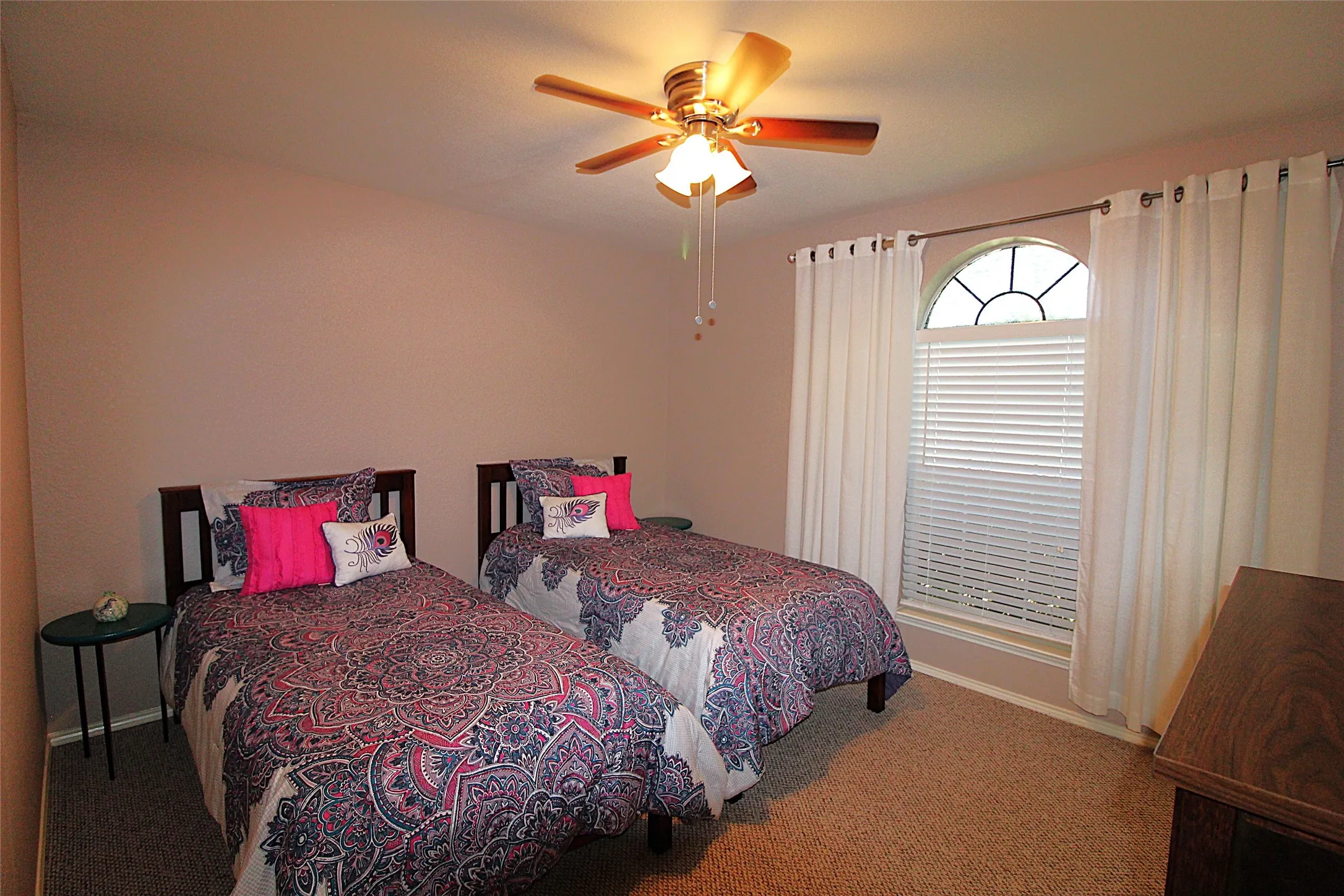 2nd Bedroom has room for two twin beds and a full sized closet, chest of drawers & a side table.