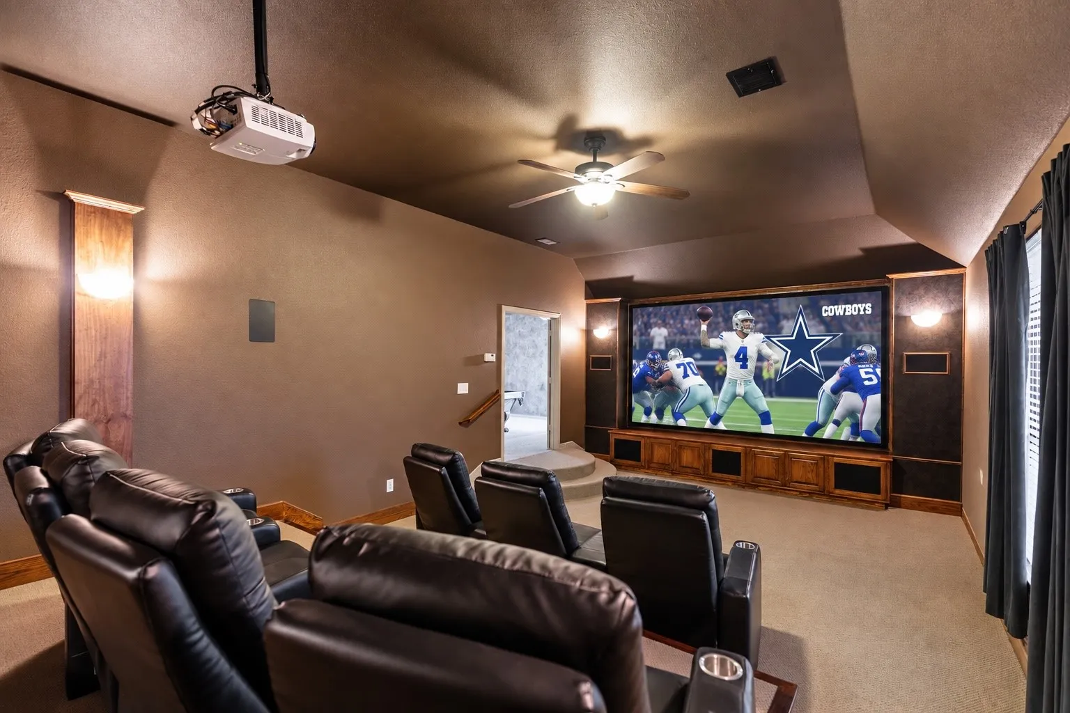 From game day gatherings to late-night films, the dedicated media room delivers the atmosphere of a private luxury theater at home.