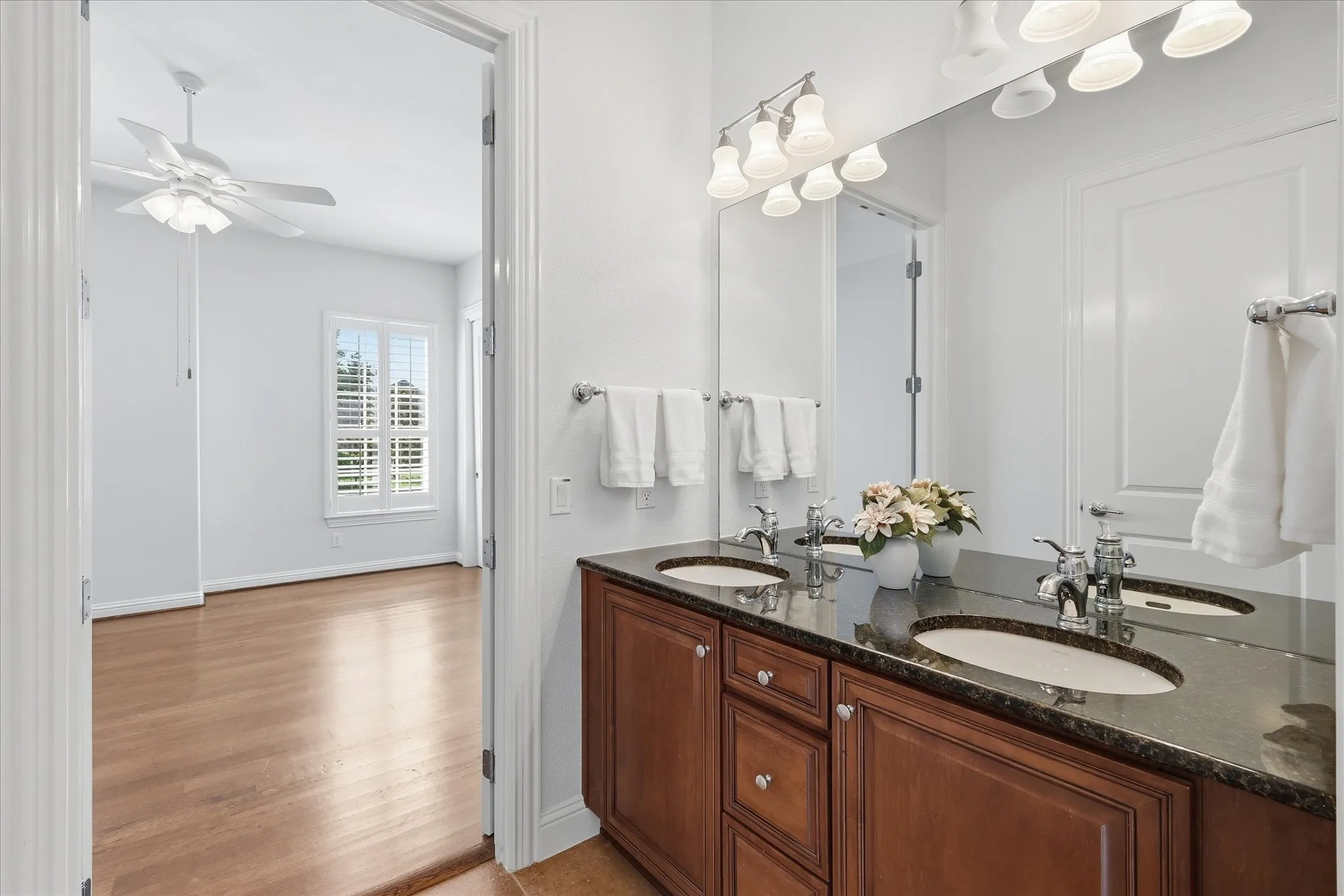 Jack and Jill bathroom with dual vanities.