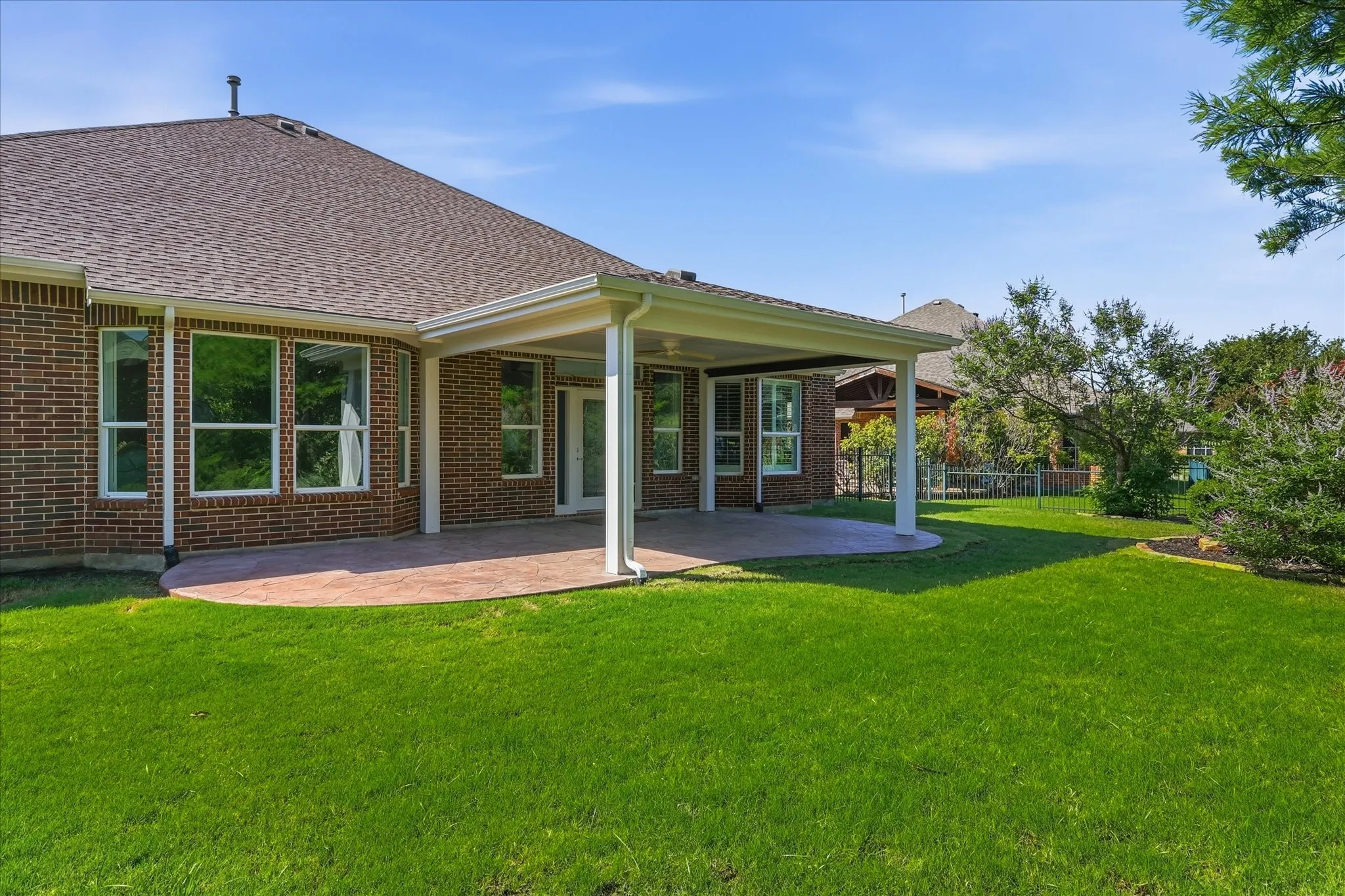 Covered back patio for entertaining.