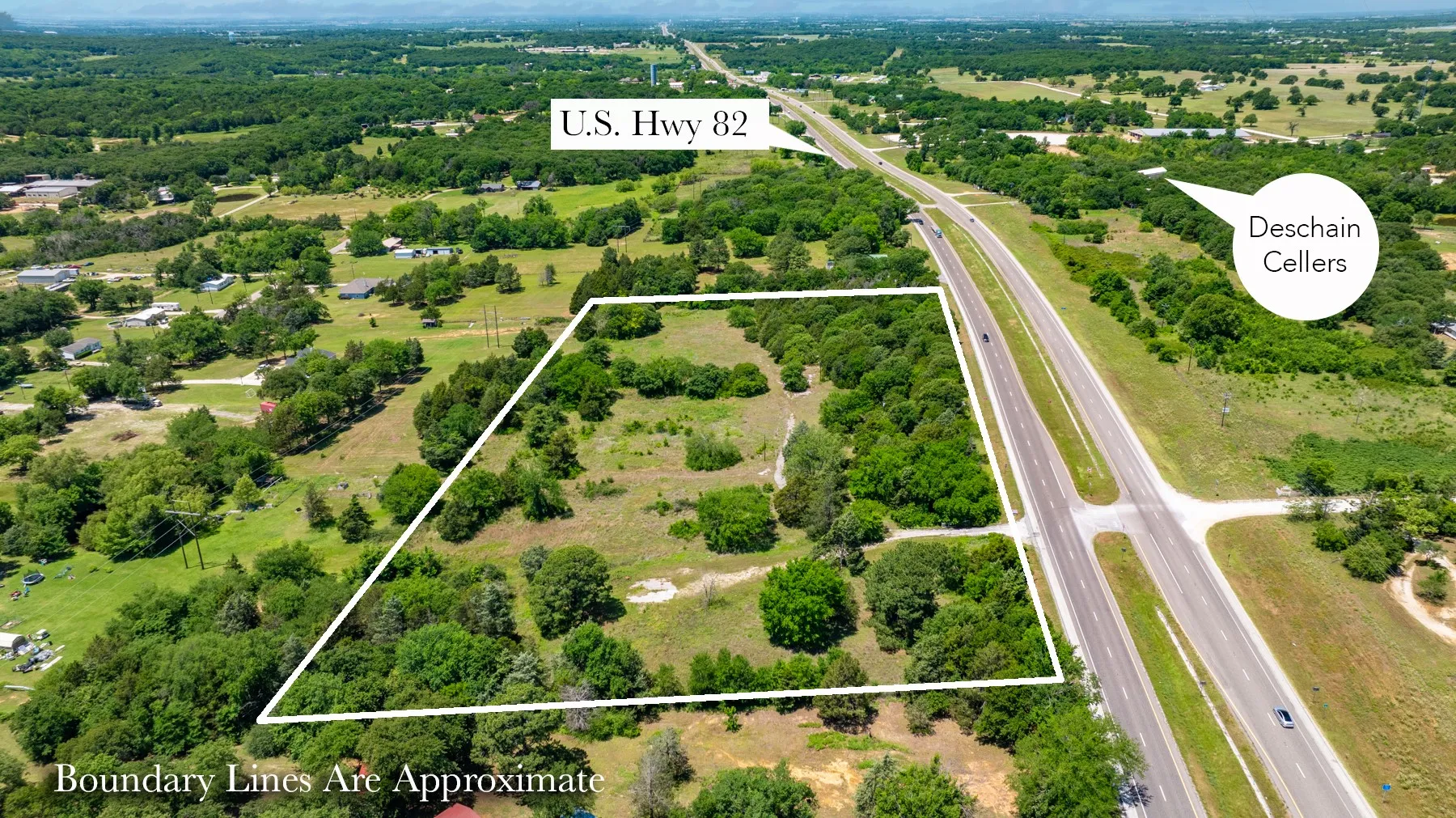 Expansive undeveloped land parcel with direct frontage on a multi-lane highway