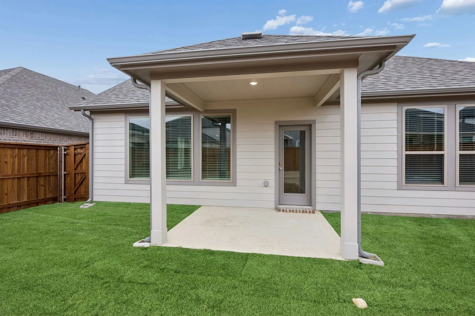 Covered Patio in the Stanley II home plan by Trophy Signature Homes – REPRESENTATIVE PHOTO