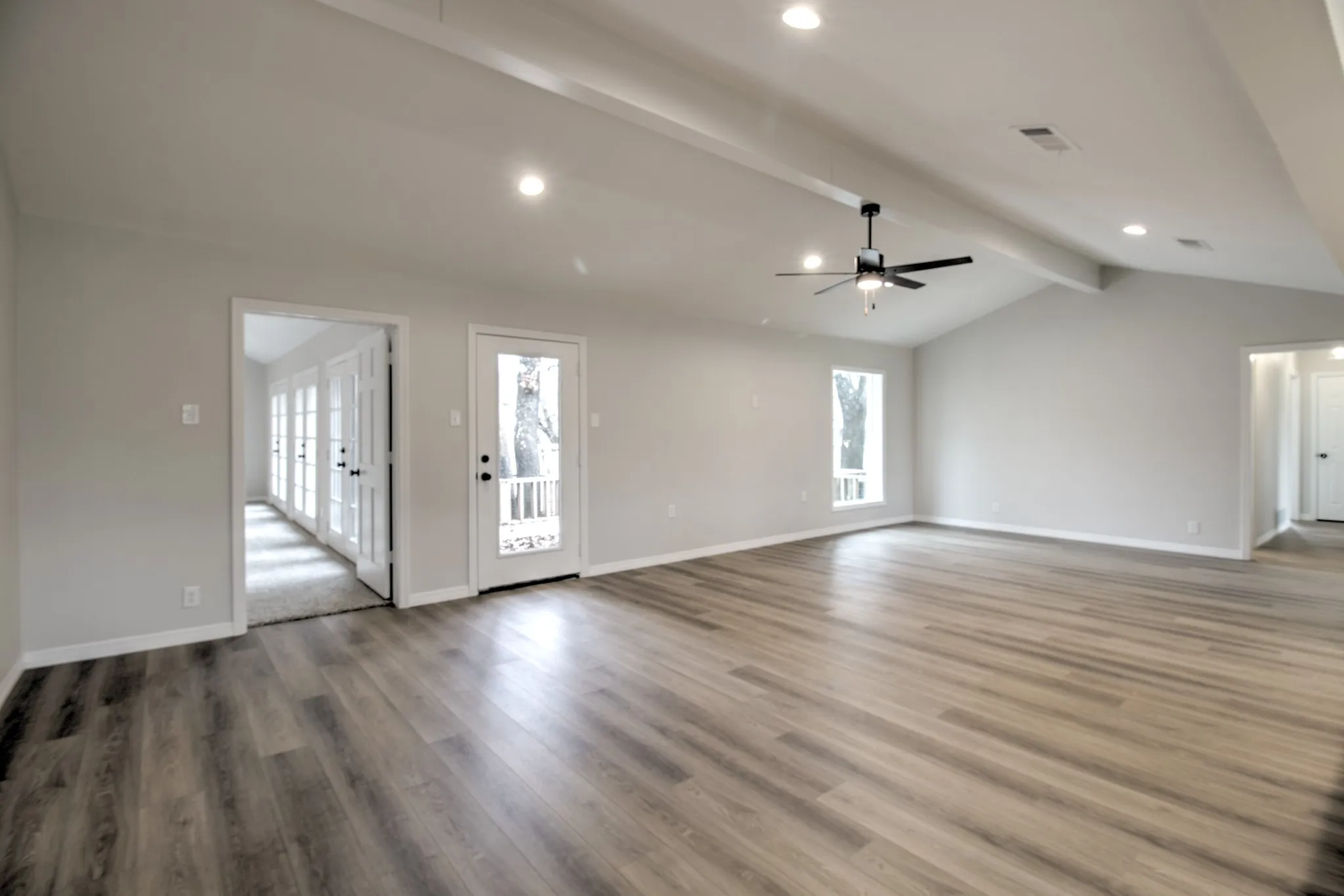Living room View, with vaulted ceiling.