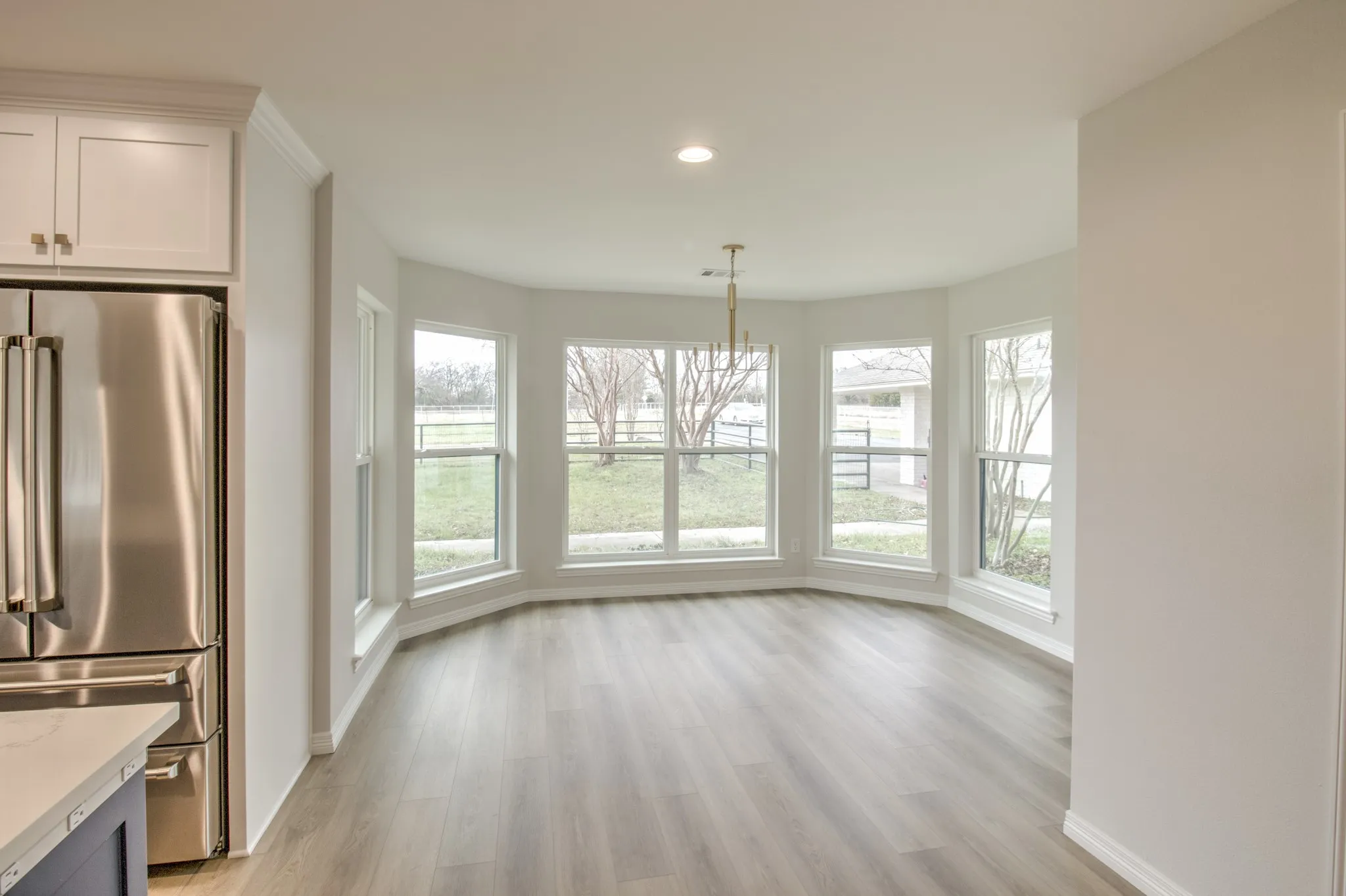 Beautiful Dinning Room with a view. Brand New windows through out the home.