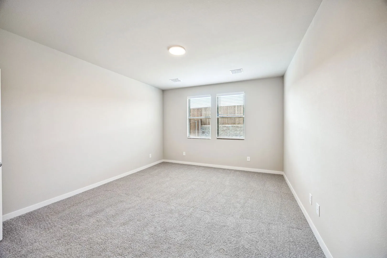 Primary Suite in the Willow home plan by Trophy Signature Homes – REPRESENTATIVE PHOTO